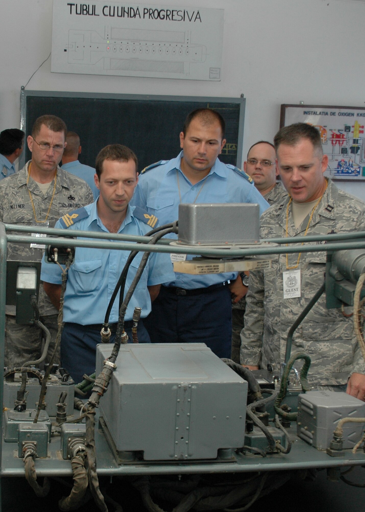 U.S. and Romanian Air Force members tour through the Traian Vuia Air Force Warrant Officer and NCO Military School in Boboc, Romania, Aug. 25, 2009.  The tour was part of a three-person U.S. Air Forces in Europe Maintenance NCO Training Program Traveling Contact Team visit with RoAF aircraft maintainers and WO and NCO school instructors Aug. 25-28. (U.S. Air Force photo/Tech. Sgt. Michael O’Connor)
