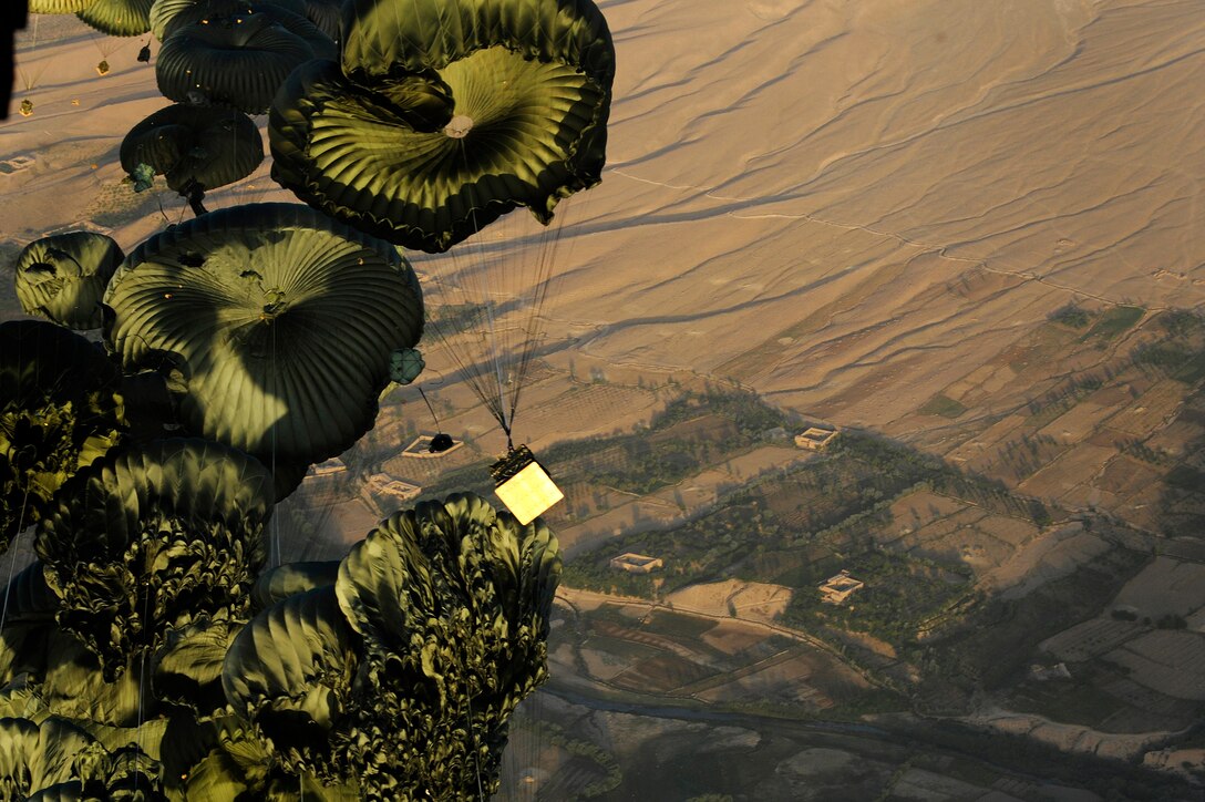 Pallets of cargo drop from a C-17 Globemaster III to a forward operating base in Afghanistan, Aug. 27, 2009, in support of Operation Enduring Freedom. The aircraft is assigned to the 817th Expeditionary Airlift Squadron at an air base in Southwest Asia. (U.S. Air Force photo/Staff Sgt. Michael B. Keller)