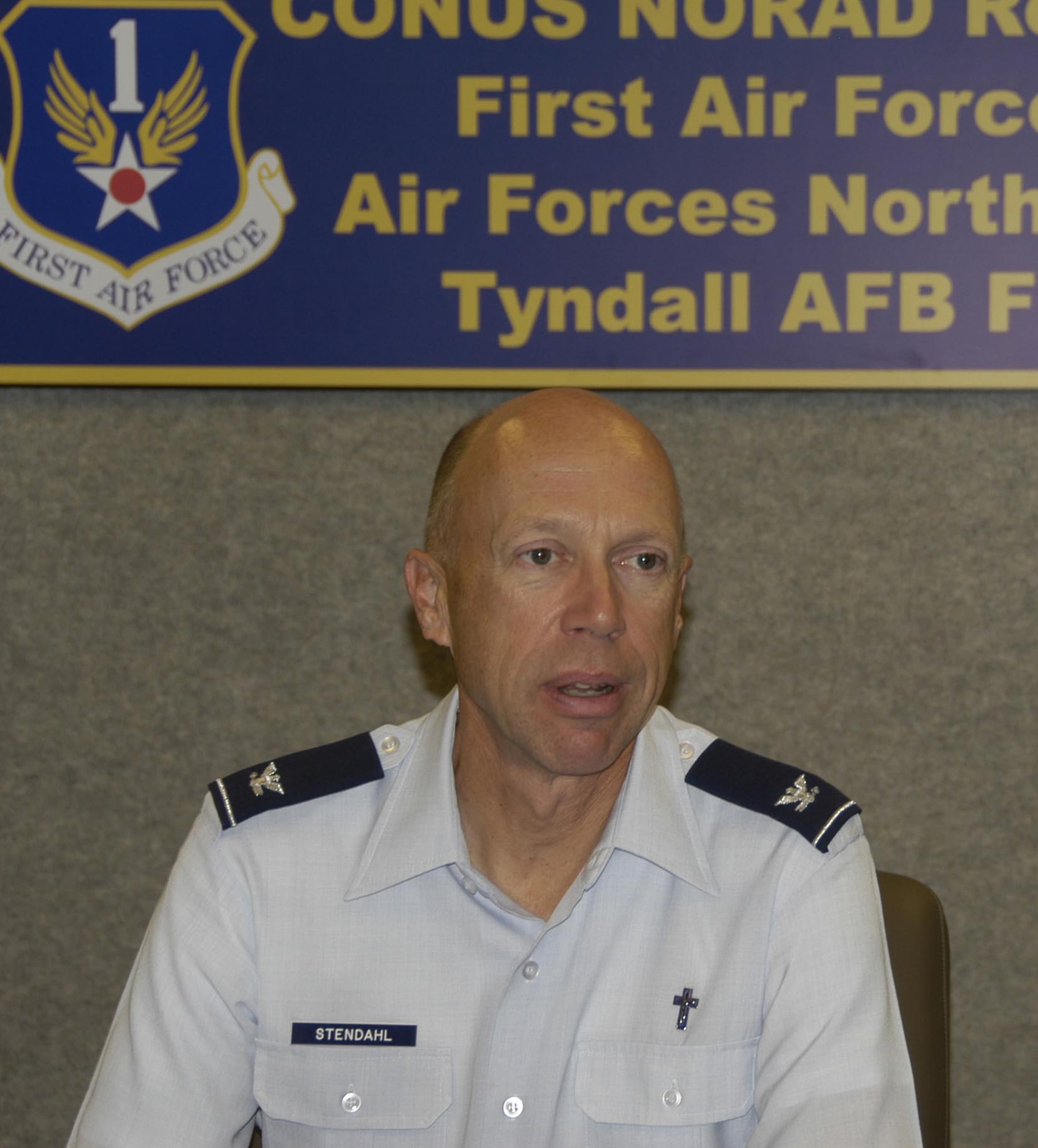 Col. Howard Stendahl, Chaplain for Air Combat Command, speaks to members of 1st Air Force during his visit to Tyndall AFB, Fla.