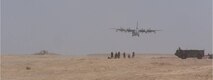 A C-130 lands on an assault landing strip built by the 809th Expeditionary RED HORSE Squadron, Marine Corps, Navy Seabees and local contractors at Dwyer Forward Operating Base, Afghanistan. (Courtesy photo)
