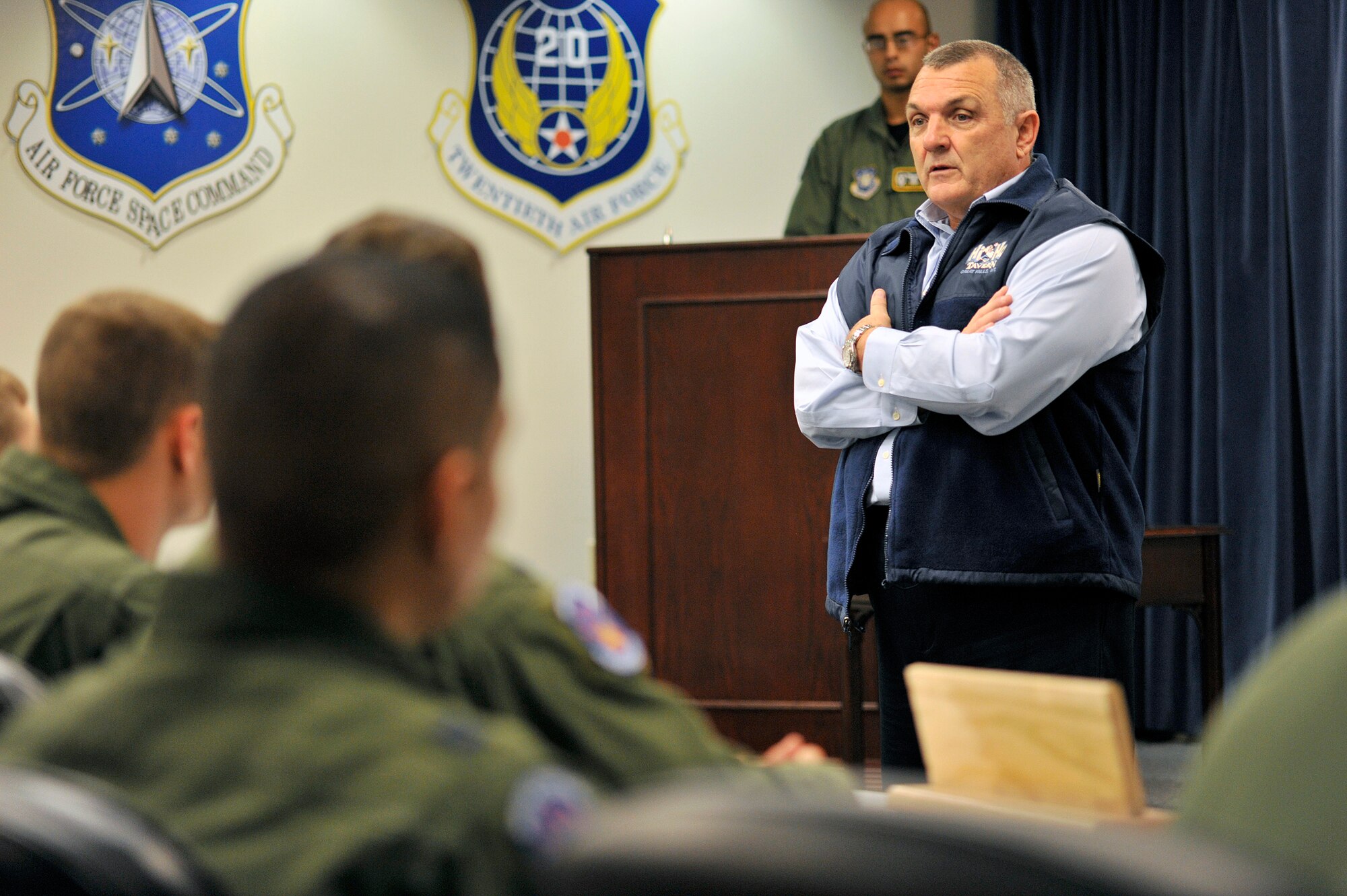 Mr. Daniel "Rudy" Ruettiger, a Notre Dame football legend and the real life inspiration for the feature film "Rudy", speaks to members of the 341st Operations Group during his tour of Malmstrom Air Force Base Aug. 28. (U.S. Air Force photo/John Turner)