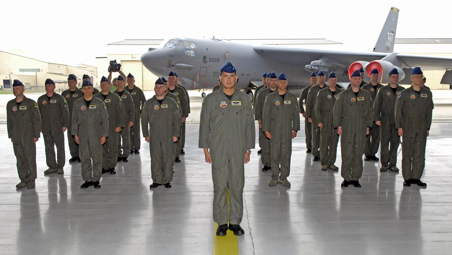 MINOT AIR FORCE BASE, N.D. -- 69th Bomb Squadron members watch as the squadron commander addresses them for the first time during the 69th activation ceremony here Sept. 3. The new unit is the fourth operational B-52H Stratofortress squadron in the Air Force and joins the 23rd Bomb Squadron as the second squadron at Minot.  Barksdale Air Force Base, La. has two operational B-52 units, the 20th and 96th. (U.S. Air Force Photo by Airman 1st Class Benjamin Stratton)