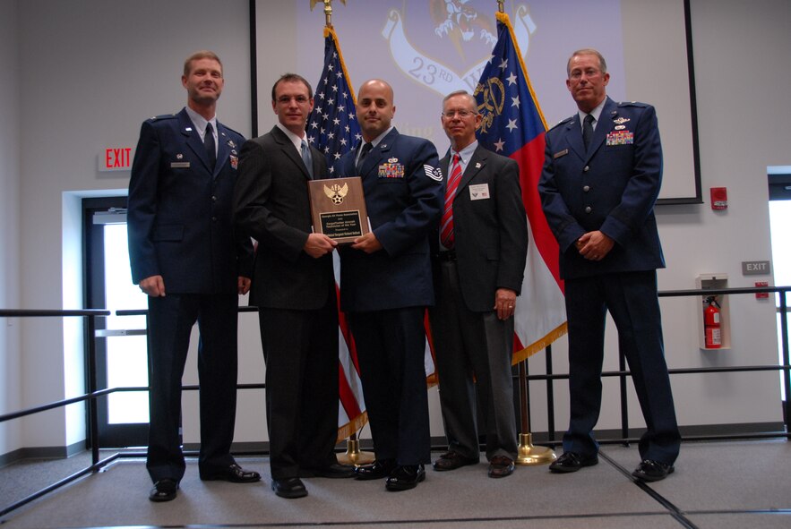 SAVANNAH, Ga. -- Tech. Sgt. Richard Belford, 23rd Equipment Maintenance Squadron at Moody Air Force Base, Ga., receives the Cargo/Tanker Aircraft Technician of the Year Award for the 2009 Georgia Air Force Association Awards here Aug. 29. (Courtesy photo)