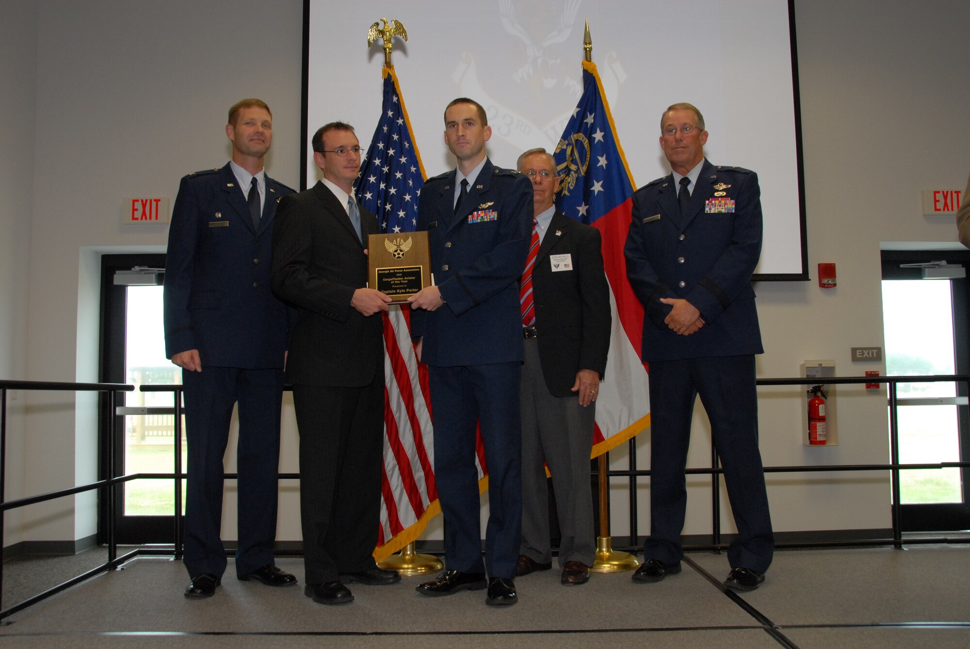 SAVANNAH, Ga. -- Capt. Kyle Porter, 71st Rescue Squadron at Moody Air Force Base, Ga., receives the Cargo/Tanker Aviator of the Year Award for the 2009 Georgia Air Force Association Awards here Aug. 29. (Courtesy photo)