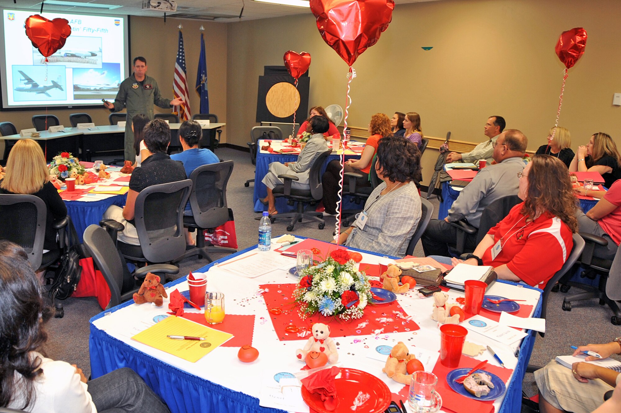 OFFUTT AIR FORCE BASE, Neb. - Brig. Gen. John N.T. Shanahan, 55th Wing commander,  welcomes new Offutt community members during Heart Link event Aug. 26. Spouses of military and civilian employees were invited to a tour of the base and educated on various activities that are part of their spouse?s day -by-day work. U.S. Air Force photo by Jeff W. Gates.