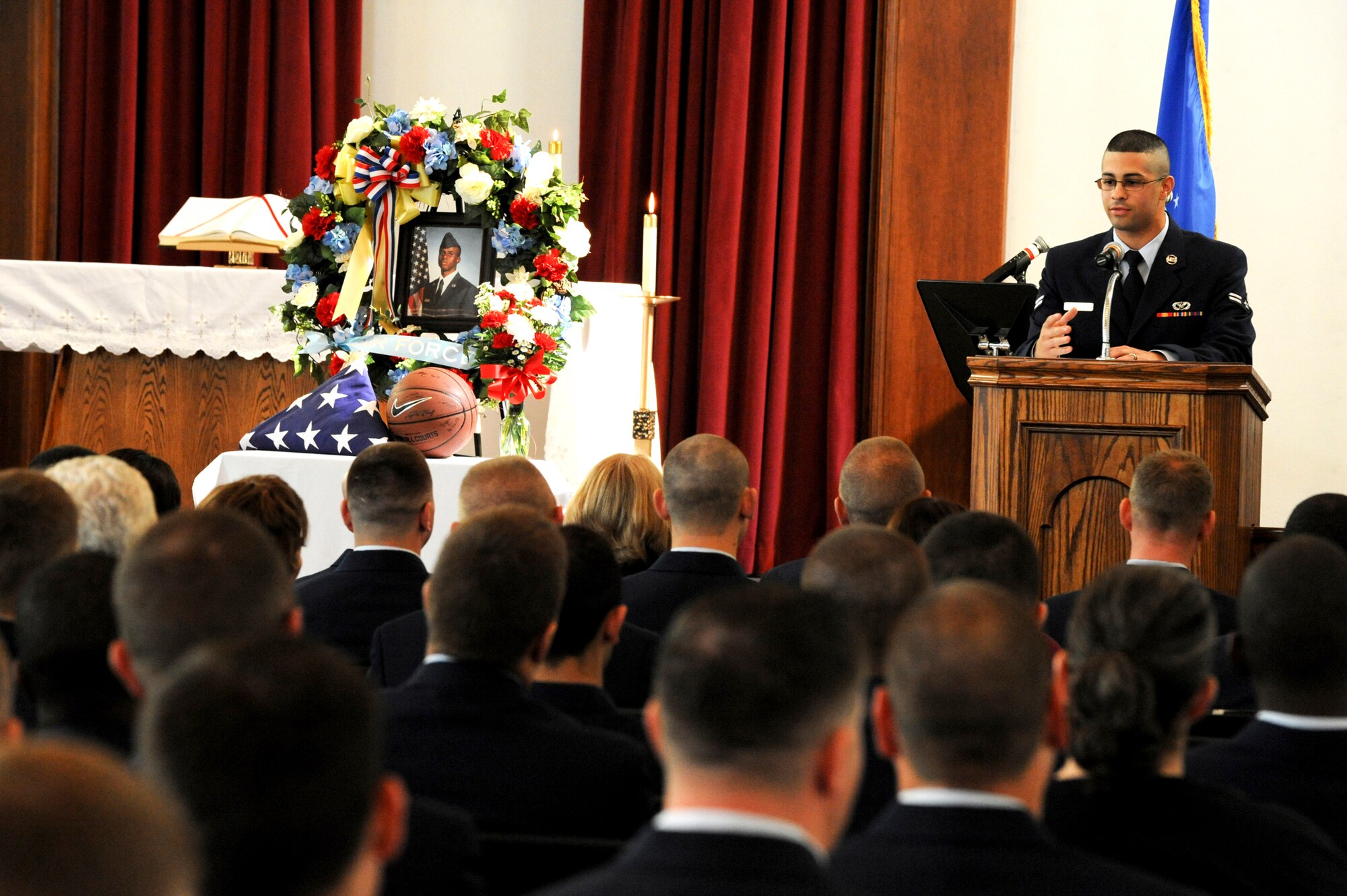ELMENDORF AIR FORCE BASE, Alaska -- Airman 1st Class Savier Rodriguez, 3rd Civil Engineer Squadron, shares memories he shared with friend Airman 1st Class Jonathan Fleming, 3rd CES, during the memorial ceremony for Fleming here Aug. 27. The ceremony, which was open to the base, was held in honor of Fleming who recently passed away from injuries suffered in a vehicle accident. (U.S. Air Force photo/Staff Sgt. Joshua Garcia)