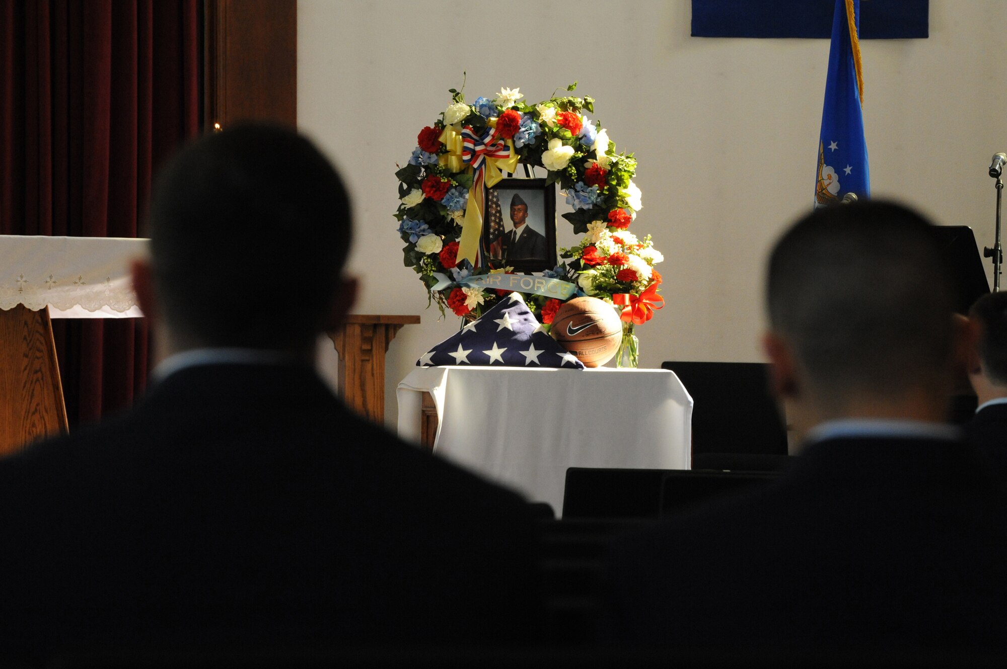 ELMENDORF AIR FORCE BASE, Alaska -- Members of the 3rd Wing attend the memorial ceremony for Airman 1st Class Jonathan Fleming, 3rd Civil Engineer Squadron, during the memorial ceremony Aug. 27. The ceremony honored Fleming who recently passed away from injuries suffered in a vehicle accident. (U.S. Air Force photo/Staff Sgt. Joshua Garcia)