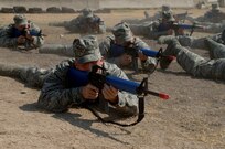 Air Force Basic Military Training trainees from Lackland's 326th Training Squadron practice getting into the prone position during combat skills training. (U.S. Air Force photo/Senior Airman Nicole Roberts) 