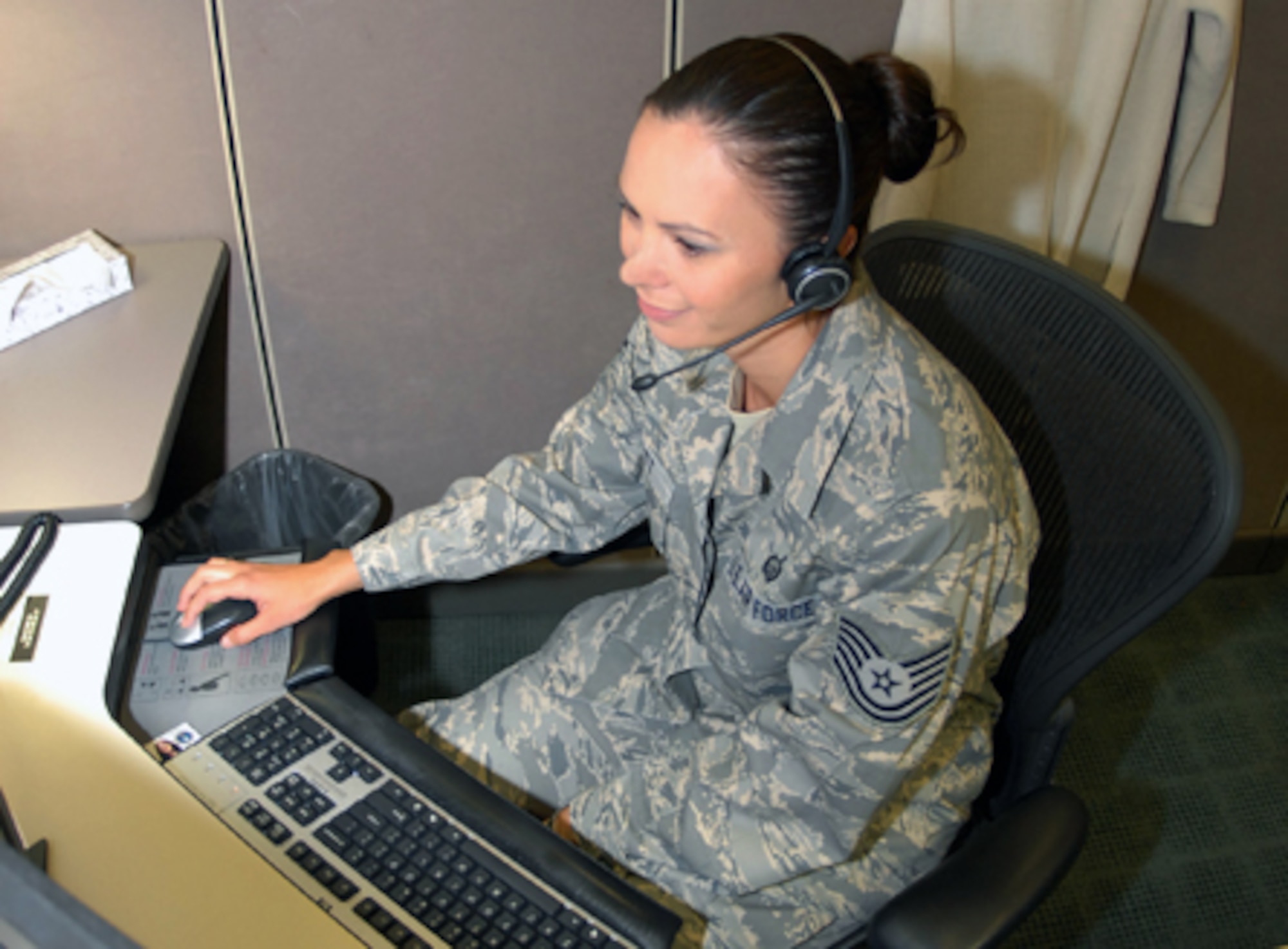Tech. Sgt. Shannon Elliott is a customer service counselor in the Air Reserve Personnel Center's contact center. ARPC recently surpassed one million customer issues since the Center began using customer relationship management tools in 2004. (U.S. Air Force photo/Dwayne Beuthel)