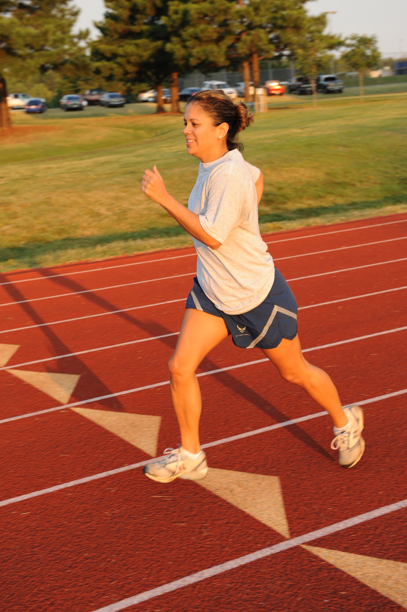 Tech. Sgt. Michelle Ana, 19th Logistic Readiness Squadron maintenance supply liason, sprints during a morning physical training session at Little Rock Air Force Base, Ark. Sept. 2. (US Air Force photo by Senior Airman Jim Araos)