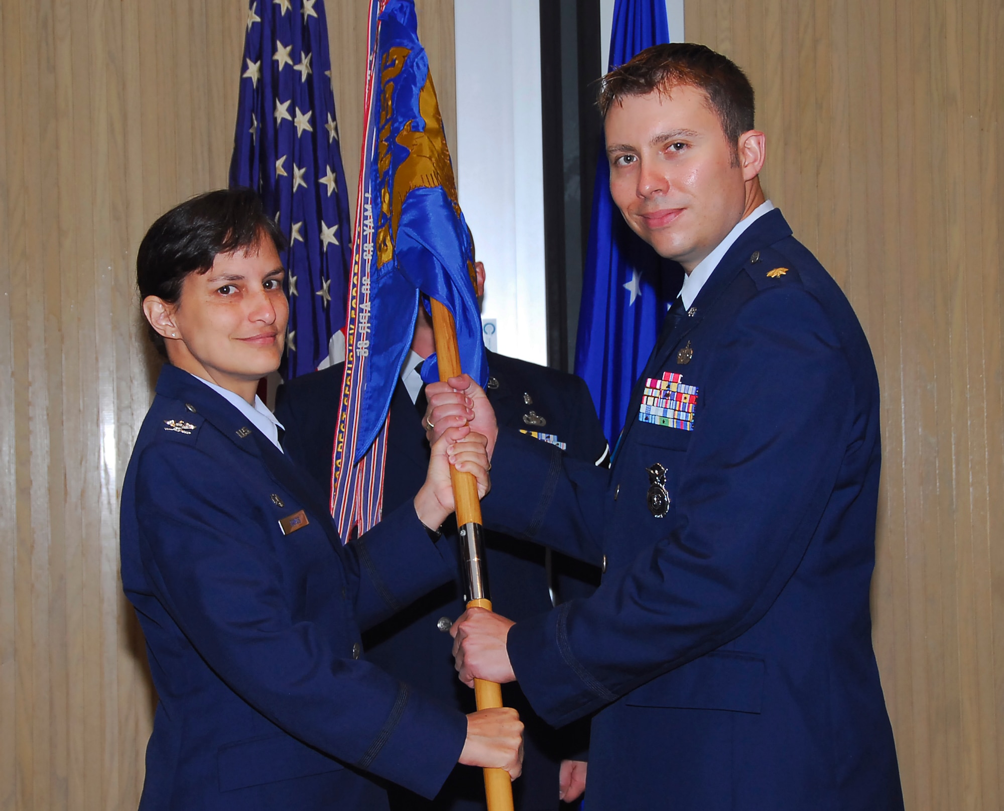 Col. Kimberley Ramos, Commander of the 82nd Mission Support Group transfers command of the 82nd Security Forces Squadron to Maj. Joe F. Wildman Aug. 31. Major Wildman will be taking over for Maj. William Lowery. (U.S. Air Force photo/ Harry Tonemah)