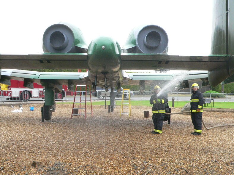Members of the 423d Civil Engineer Squadron performed maintenance on the A-10 static display aircraft on RAF Alconbury Aug. 31.  Following the guidance of the USAFE historian, 17 personnel scrubbed the airplane with soft bristle brushes using a mild detergent to carefully clean the surface removing the buildup of dirt, moss and bird droppings.

The cleaning helped to prevent corrosion and damage to the aircraft.  CE saved $2,000 on contracted cleaning and accomplished the job to coincide with the completion of the pavement work in the A-10 area.  The work is part of a $790,000 basewide pavement upgrade project.  It will be completed in time for the Air Force’s birthday celebration and the Battle of Britain Sunset ceremony to be held on Sept. 24 and attended by local civic dignitaries. (U.S. Air Force Photo by Master Sgt C. Osbourne)
