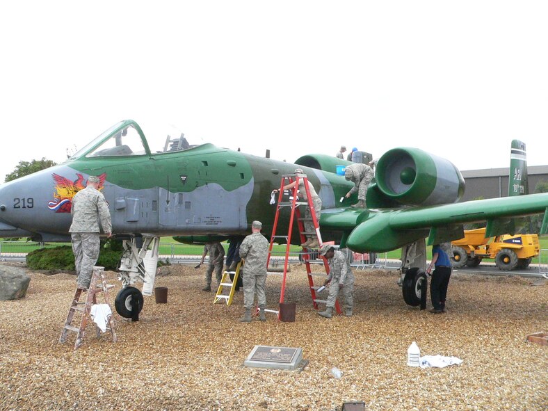 Members of the 423d Civil Engineer Squadron performed maintenance on the A-10 static display aircraft on RAF Alconbury Aug. 31.  Following the guidance of the USAFE historian, 17 personnel scrubbed the airplane with soft bristle brushes using a mild detergent to carefully clean the surface removing the buildup of dirt, moss and bird droppings.

The cleaning helped to prevent corrosion and damage to the aircraft.  CE saved $2,000 on contracted cleaning and accomplished the job to coincide with the completion of the pavement work in the A-10 area.  The work is part of a $790,000 basewide pavement upgrade project.  It will be completed in time for the Air Force’s birthday celebration and the Battle of Britain Sunset ceremony to be held on Sept. 24 and attended by local civic dignitaries.
