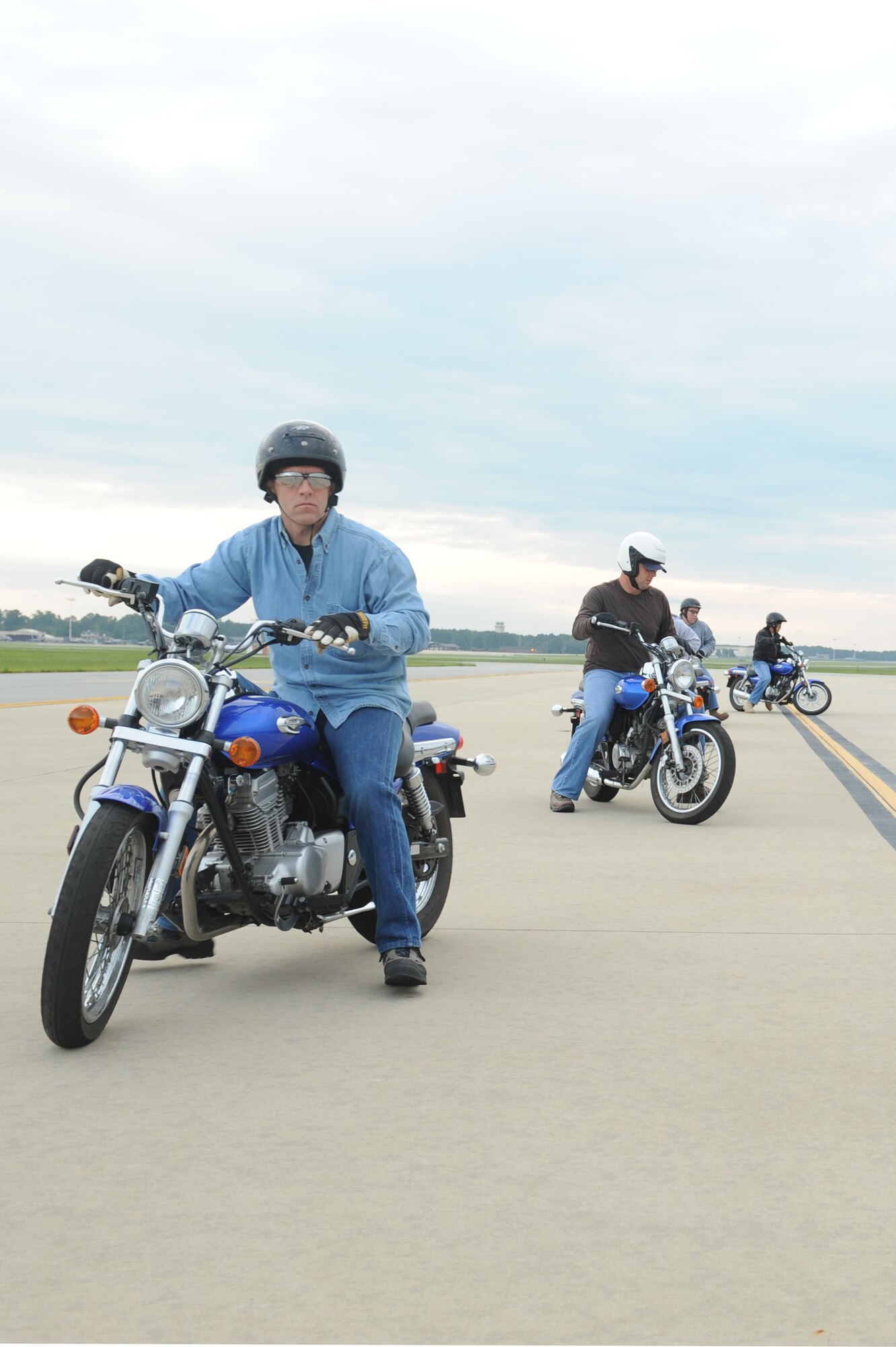 Students practice the proper technique for turning around, during a basic rider's course on Seymour Johnson Air Force Base, N.C., Sept. 1, 2009. To graduate this course, students have to pass four skill evaluations tests on a motorcycle using proper technique; they also have to score 80 percent or higher on a written test. (U.S. Air Force photo by Airman 1st Class Whitney Lambert)