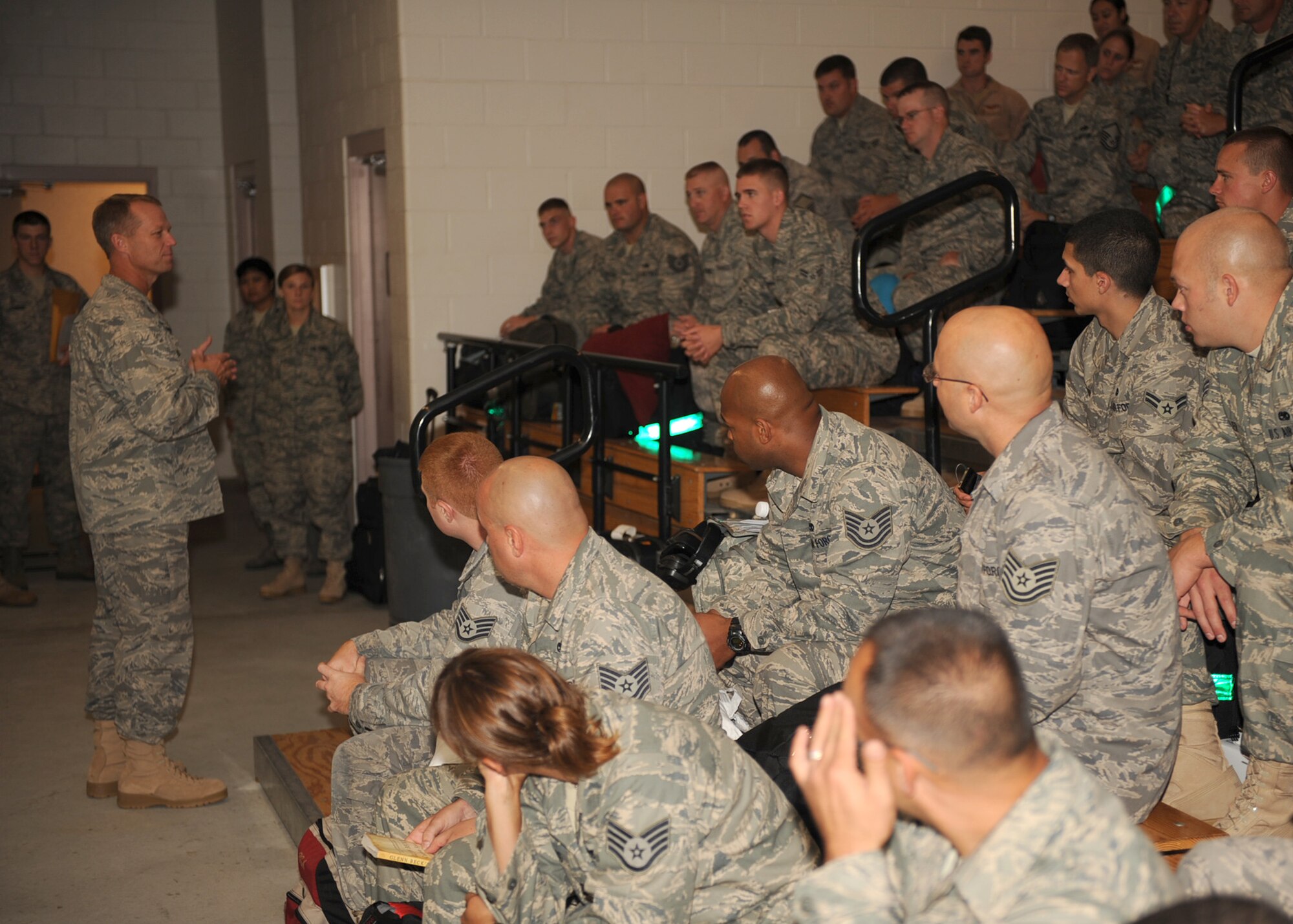 Col. Mark Kelly, 4th Fighter Wing commander, speaks to Airmen of the 335th Fighter Squadron and the 4th Maintenance Group prior to their deployment from Seymour Johnson Air Force Base, N.C., Sept. 1, 2009. This is the last Seymour Johnson fighter squadron deployment this year. (U.S. Air Force photo by Senior Airman Ciara Wymbs)