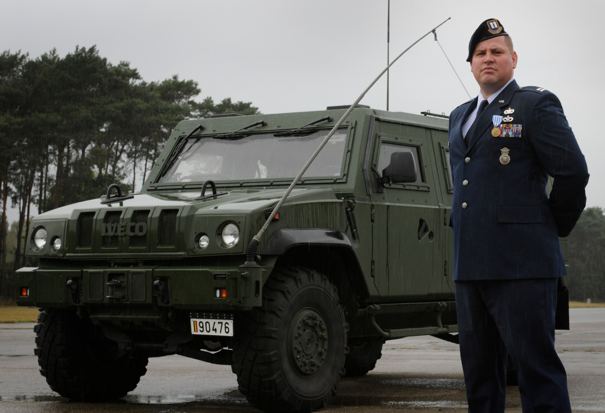 SPANGDAHLEM AIR BASE, Germany – Capt. Andrew Legault, 701st Munitions Support Squadron security forces commander, poses in front of a Belgian light multi-role vehicle after being awarded the Belgian Meritorious Medal Sept. 1. Captain Legault received the medal for outstanding efforts resulting in excellent ratings during the most recent weapons inspection at Kleine Brogel Air Base, Belgium. (U.S. Air Force photo/Senior Airman Benjamin Wilson)