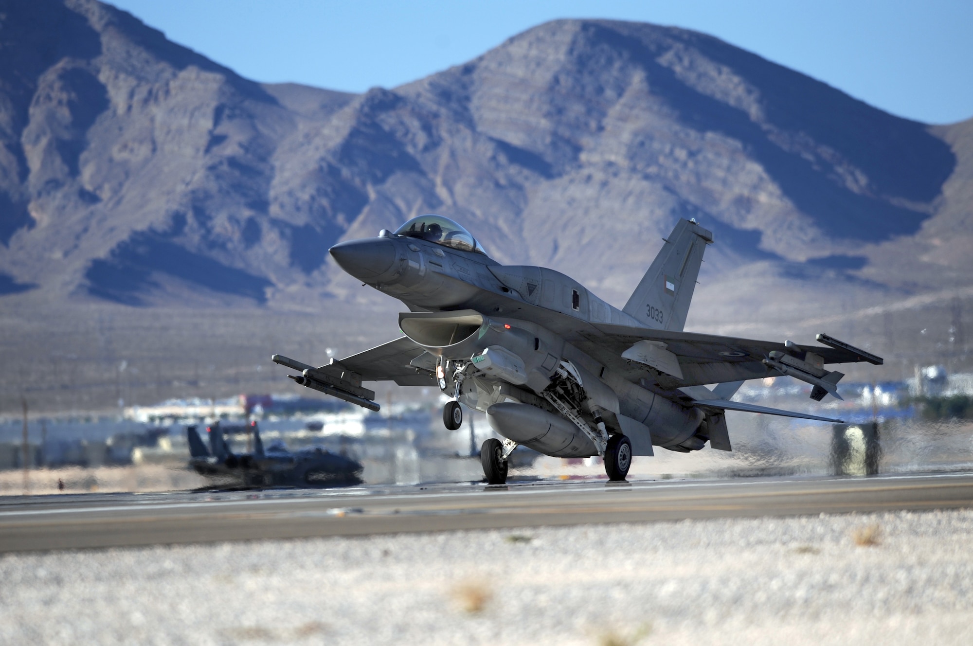 An F-16E from the United Arab Emirates lands after a training mission during Red Flag Aug. 26, 2009, at Nellis Air Force Base, Nev.  This is the first time the nation has participated in Red Flag, a realistic two-week air combat training exercise conducted over the 15,000-square-mile Nevada Test and Training Range north of Las Vegas.  The exercise ends Sept. 4. (U. S. Air Force photo/Tech. Sgt. Michael R. Holzworth)