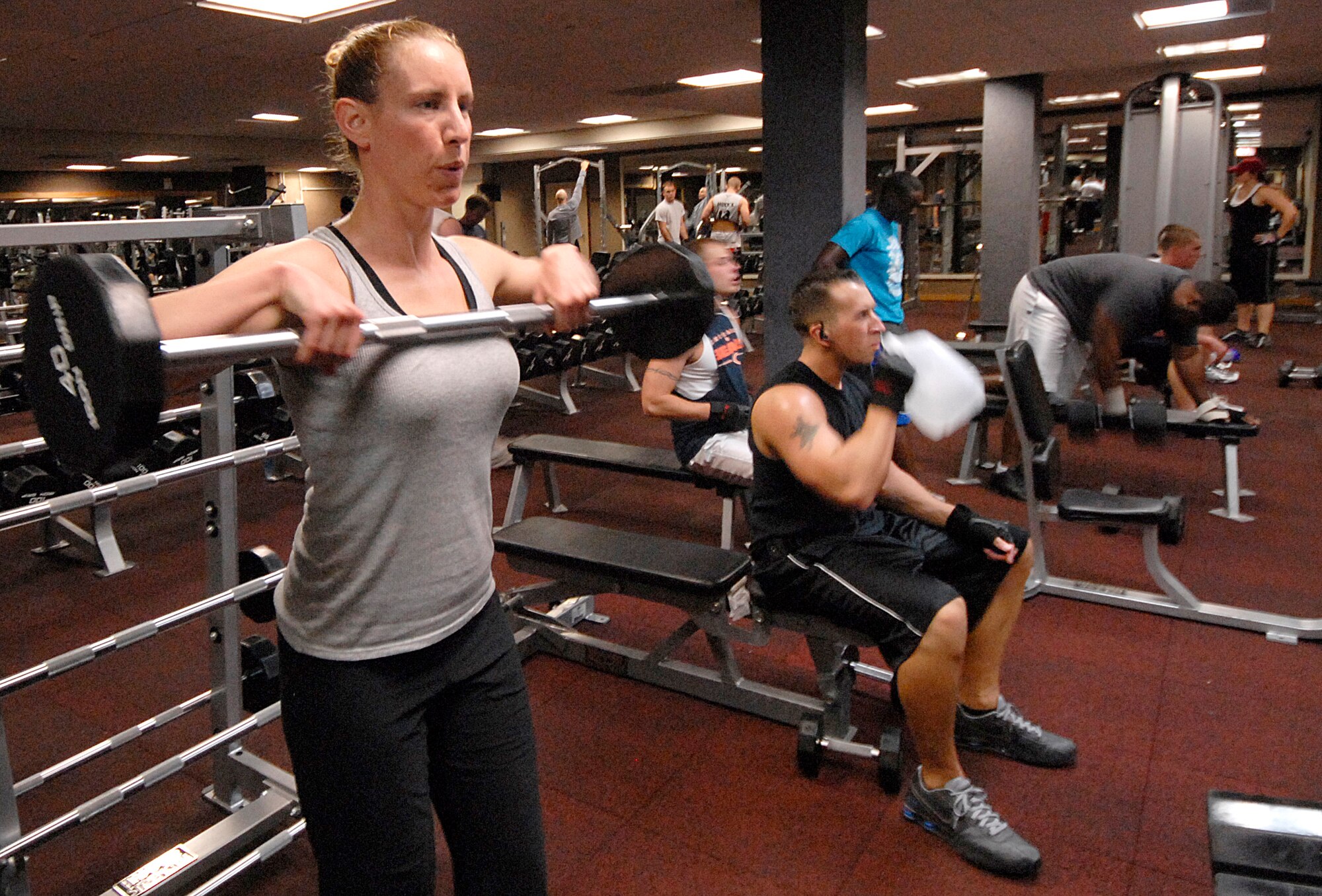 SPANGDAHLEM AIR BASE Germany – Staff Sgt. Elizabeth Spradley assigned to the 52nd Civil Engineering Squadron, gets in a workout at the Skelton Memorial Fitness Center Sept. 1.   Fitness center patrols can now get a workout in after work or at 3 a.m.  The Skelton Fitness Center is now open 24/7 weekdays for all Sabers to work out. (U.S. Air Force photo/Master Sgt. Bill Gomez)