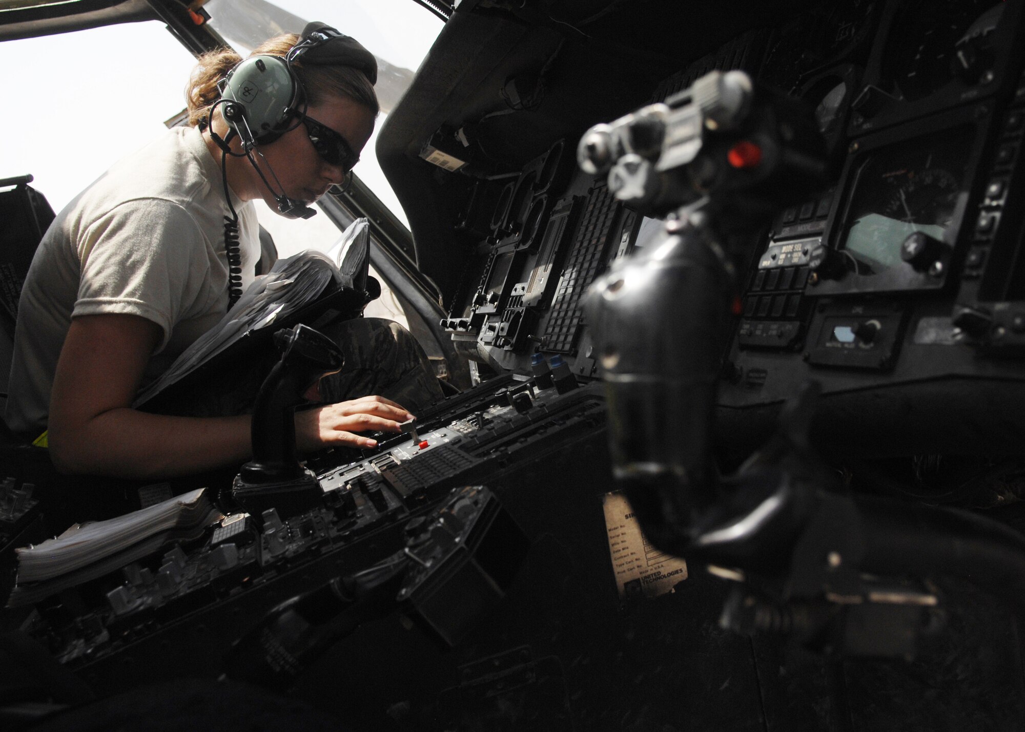 JOINT BASE BALAD, Iraq -- Senior Airman Casey Hardy of the 64th Expeditionary Helicopter Maintenance Squadron conducts an inertial navigation system in-flight write up on an HH-60G Pave Hawk here Sep 1. The INS in-flight write up helps to ensure the Pave Hawk is mission capable and fully operational. (U.S. Air Force photo/Senior Airman Christopher Hubenthal)