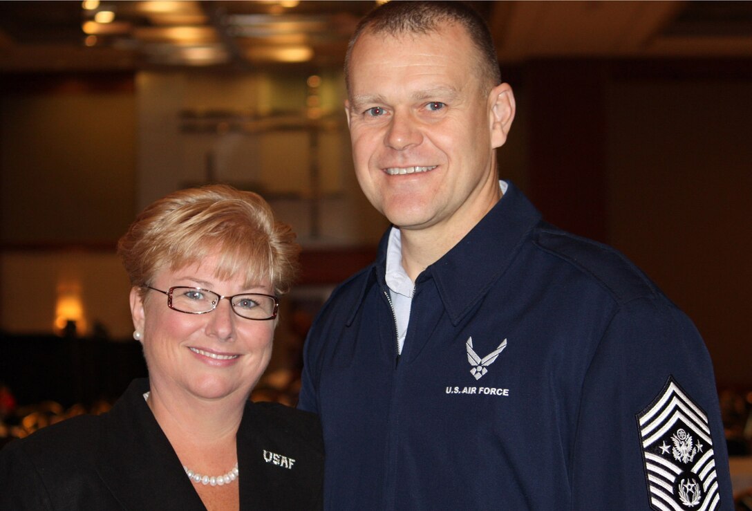Chief Master Sgt. of the Air Force James A. Roy and his wife, Paula, attend the Defense Department's Joint Family Readiness Conference in Chicago. Roy, along with the senior enlisted advisors for the Army, Navy and Marines, spoke at a town hall for conference participants Sept. 1, 2009. 