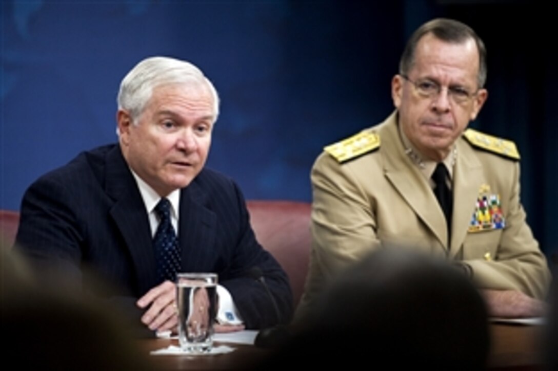 Defense Secretary Robert M. Gates speaks with media members during a press conference with Navy Adm. Mike Mullen, chairman of the Joint Chiefs of Staff, at the Pentagon, Sept. 3, 2009.  