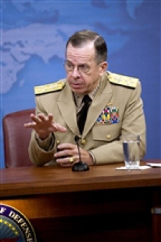 Chairman of the Joint Chiefs of Staff Adm. Mike Mullen, U.S. Navy, speaks with members of the Pentagon press corps during a press briefing with Secretary of Defense Robert M. Gates in the Pentagon on Sept. 3, 2009.  