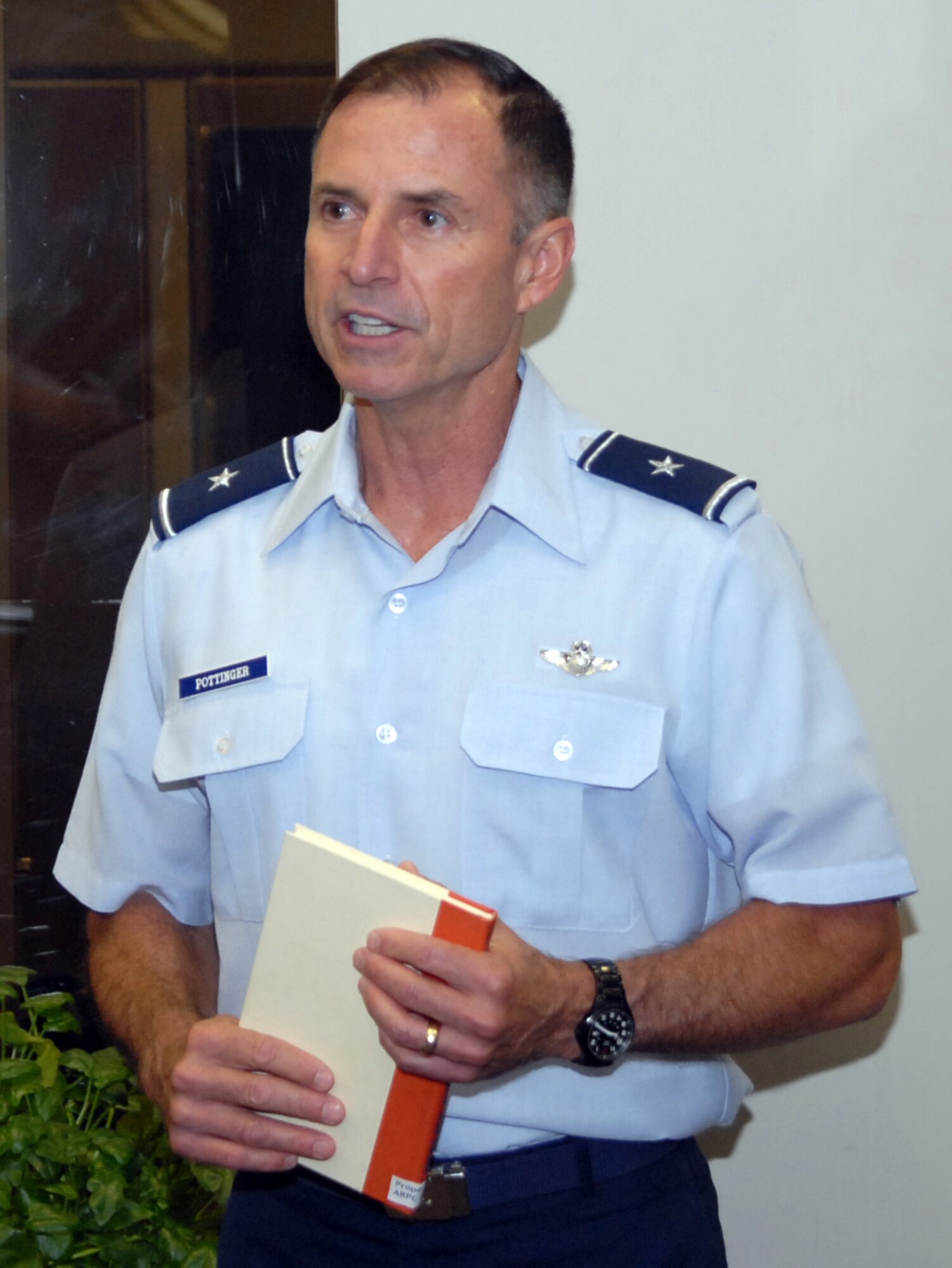 Brig. Gen. Kevin Pottinger, ARPC commander, speaks during the grand opening of ARPC's career development library Aug. 31. The library contains 192 books, audio documents and course materials related to career broadening and improvement. (U.S. Air Force photo/Dwayne Beuthel) 