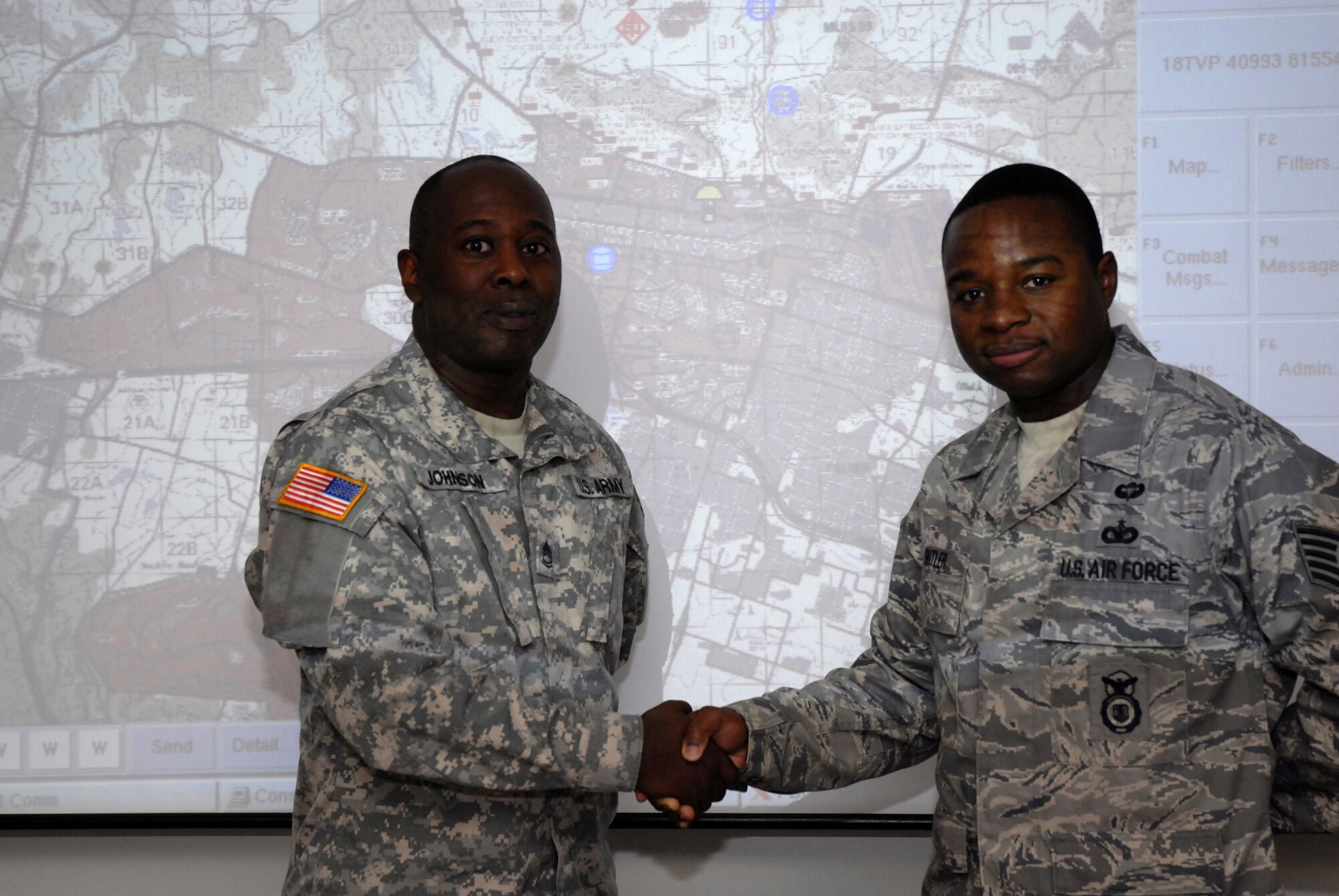 Contingency skills instructor Tech. Sgt. Shaylin Butler from the 421st Combat Training Squadron partnered with U.S. Army Sgt. 1st Class Gary Johnson from the 3rd Training Support Battalion at Fort Meade, Md., to spearhead the creation of an Air Force program allowing Airmen to train Airmen in Blue Force Tracker at the U.S. Air Force Expeditionary Center, Fort Dix, N.J.  August 29, 2009.   Having Airmen training Airmen helps alleviate some of the demand placed on the Army by reducing the Air Force's demand for their training. (U.S. Air Force Photo/Tech. Sgt. Paul R. Evans)