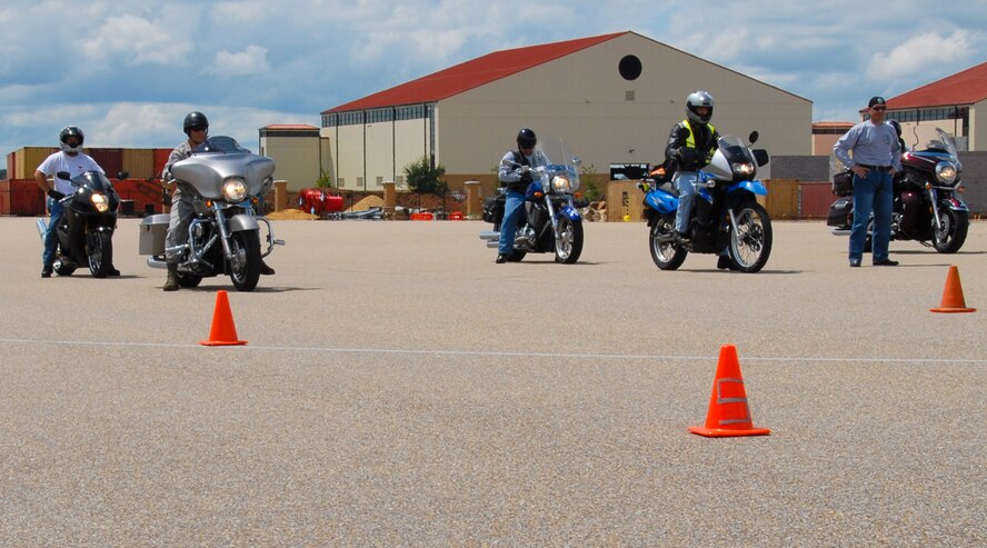 Contestants line up for the "slow-ride" competition during the first annual Green Knights motorcycle rally at Maxwell, Aug. 28. The rally was held to emphasize motorcycle safety when riding motorcycles and to garner attention and membership for the Green Knights Motorcycle Club, Chapter 10. (U.S. Air Force photo/Jamie Pitcher)