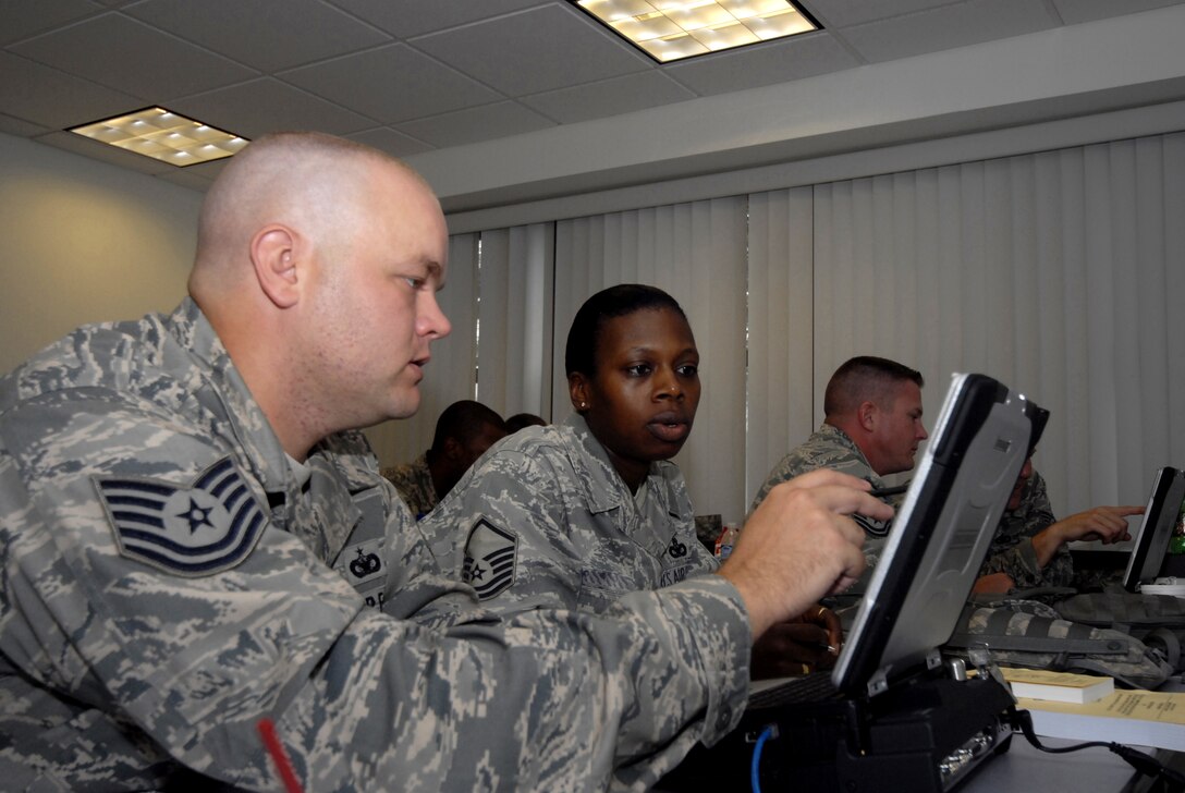 Security Forces Airmen receive vital training in the operation of Blue Force Tracker August 29, 2009, during their pre-deployment training conducted by the 421st Combat Training Squadron at the U.S. Air Force Expeditionary Center, Joint Base McGuire-Dix-Lakehurst, N.J. The Blue Force Tracker is a system that gives air and ground units and their commanders a real-time picture of the battlefield. (U.S. Air Force Photo/Tech. Sgt. Paul R. Evans)