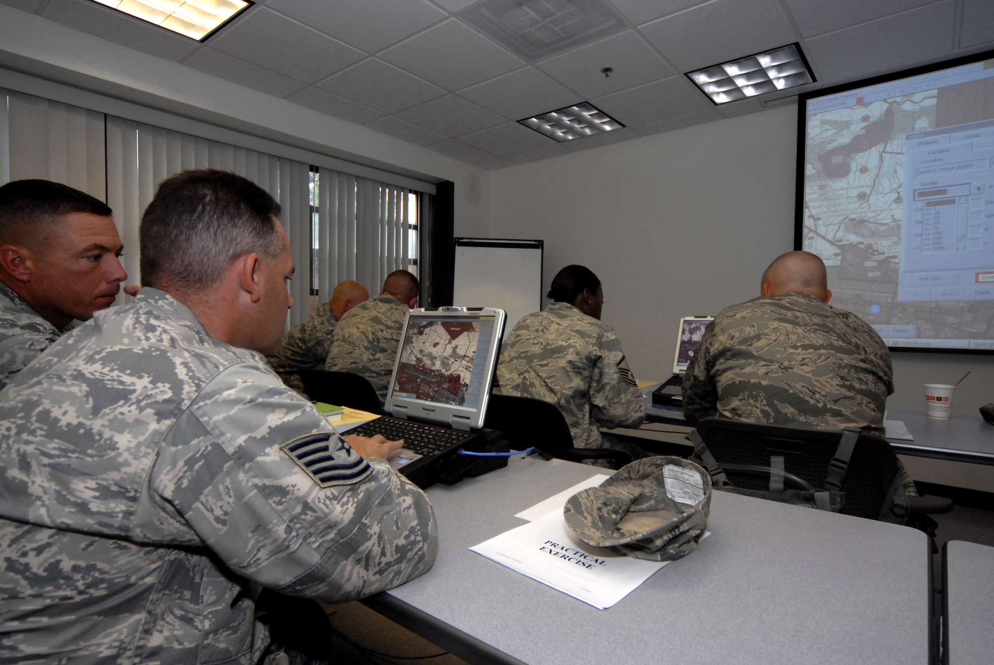 Security Forces Airmen receive vital training in the operation of Blue Force Tracker August 29, 2009, during their pre-deployment training conducted by the 421st Combat Training Squadron at the U.S. Air Force Expeditionary Center, Joint Base McGuire-Dix-Lakehurst, N.J. The Blue Force Tracker is a system that gives air and ground units and their commanders a real-time picture of the battlefield. (U.S. Air Force Photo/Tech. Sgt. Paul R. Evans)