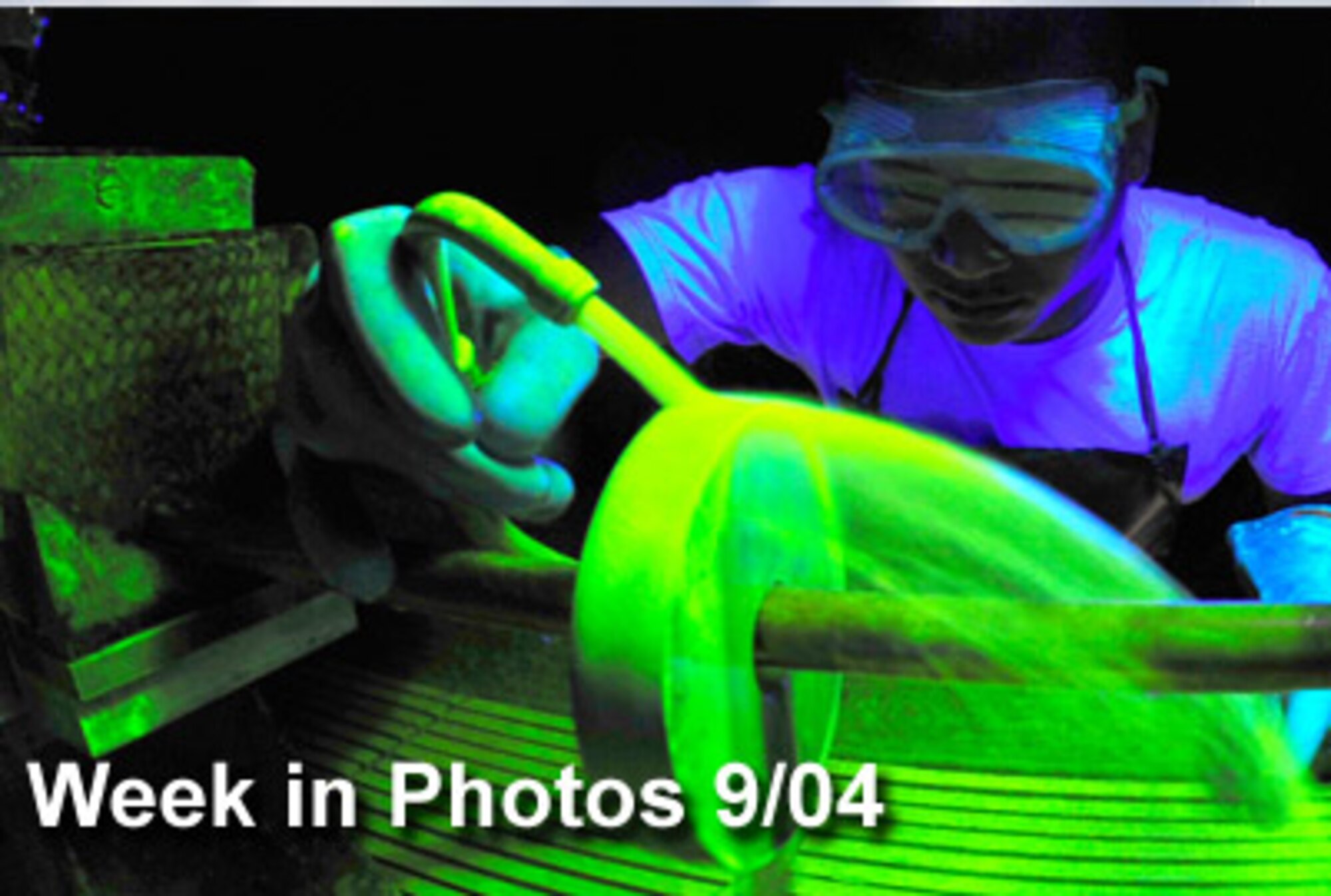 Air Force Week in Photos for Sept. 4 highlights photos from around the Air Force. In this photo by Staff Sgt. Christopher Boitz, Airman 1st Class Marvin Moss looks for surface defects under a black light Aug. 26, 2009, at Eielson Air Force Base, Alaska. (U.S. Air Force photo illustration)