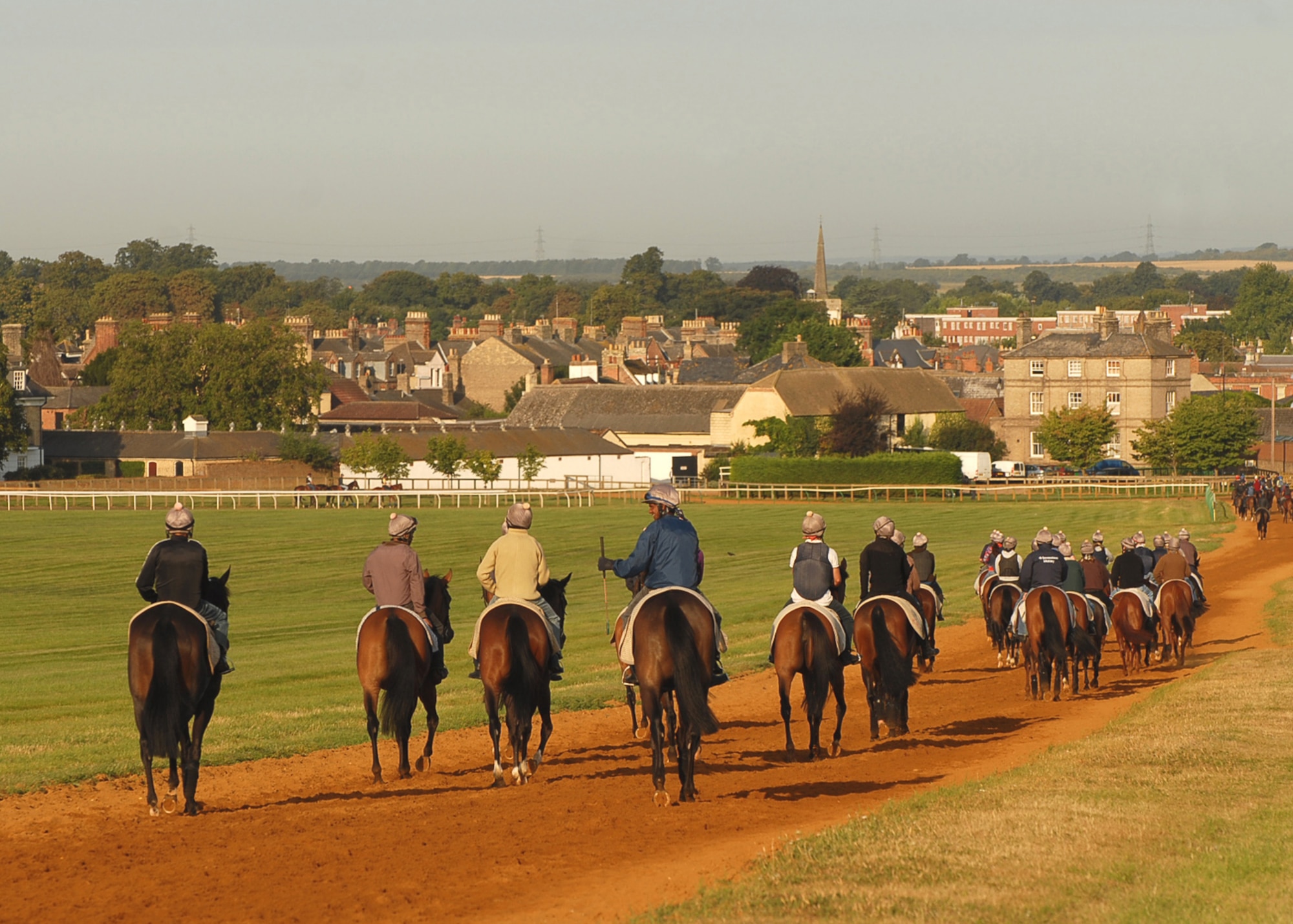 Stable lads return from exercising racehorses on Newmarket Heath.  The town is home to about 2,000 racehorses and more than 70 trainers. (U.S. Air Force photo/Judith Wakelam)