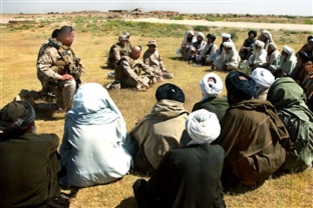 U.S. Marines speak with elders during a meeting in Helmand province, Afghanistan, Sept. 1, 2009. The Marines, assigned to the 3rd Battalion, 11th Marine Regiment, are meeting with residents to determine ways they can better serve one another.