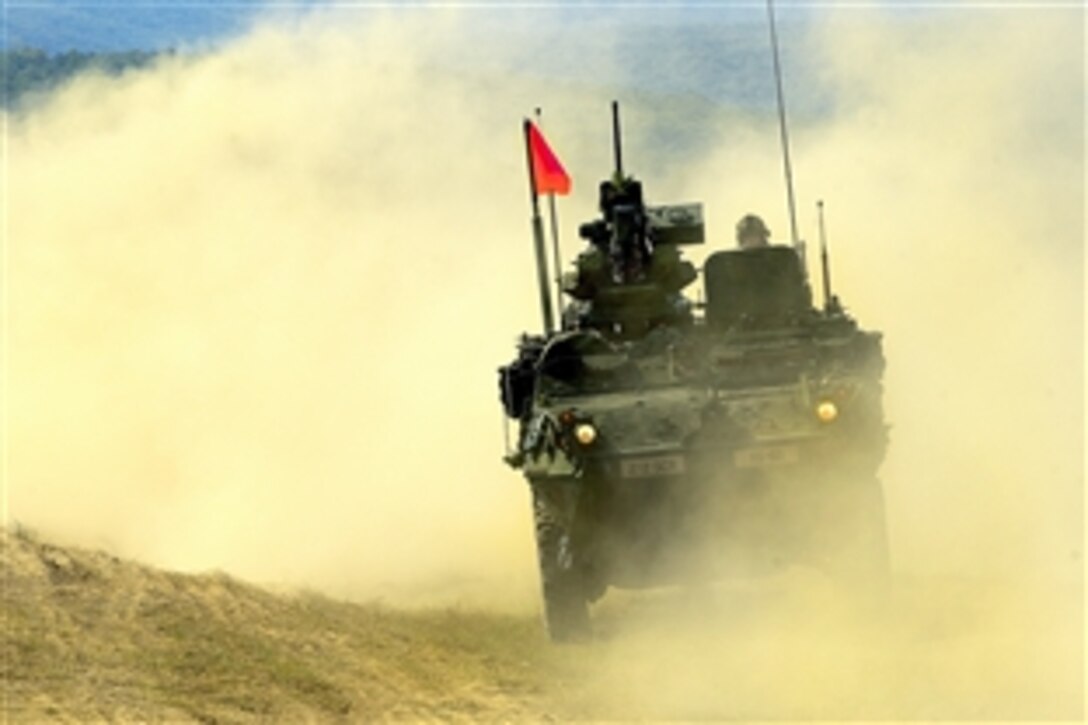 U.S. Army soldiers perform an exercise in an eight-wheeled Stryker mechanized vehicle  in a training area in Novo Selo, Bulgaria, Sept. 3, 2009. The soldiers are assigned to the 2nd Stryker Cavalry Regiment. 