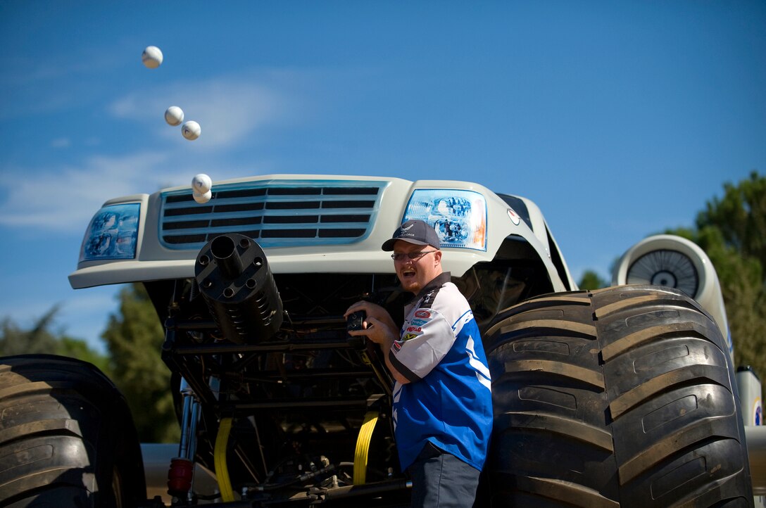 The Air Force's A-10 Monster Truck fires foam baseballs from its mock-30mm cannon during the 10th Annual Mather Mud Run in Rancho Cordova, Ca., Sept. 5 during Air Force Week Sacramento. The new monster truck is modeled after the A-10 Thunderbolt jet aircraft.  (U.S. Air Force photo/Staff Sgt. Bennie J. Davis III)