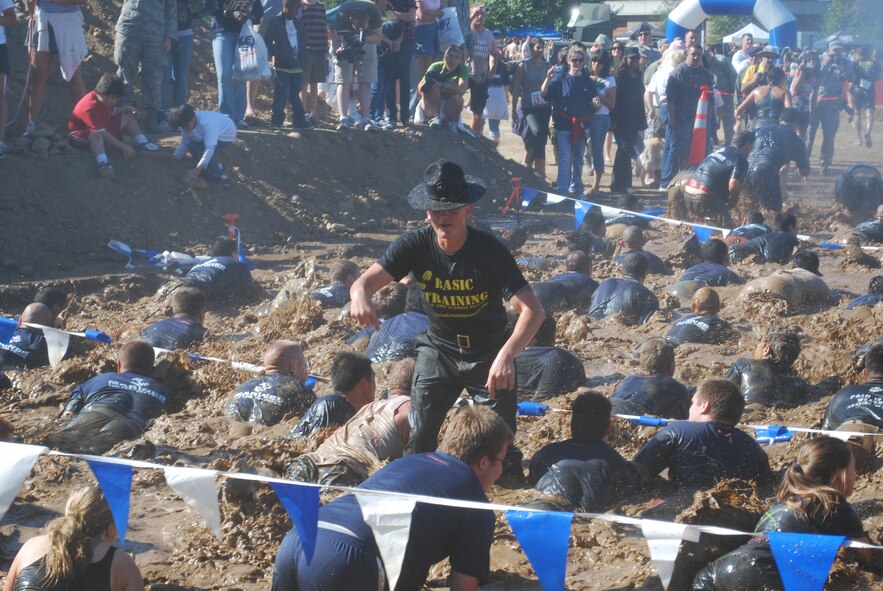 Participants take part in the Mather Mud Run Sept. 5. The Travis security forces team beat out the Sacramento County Sheriff Dept. SWAT team with a time of 6:34;24. (U.S. Air Force photo)