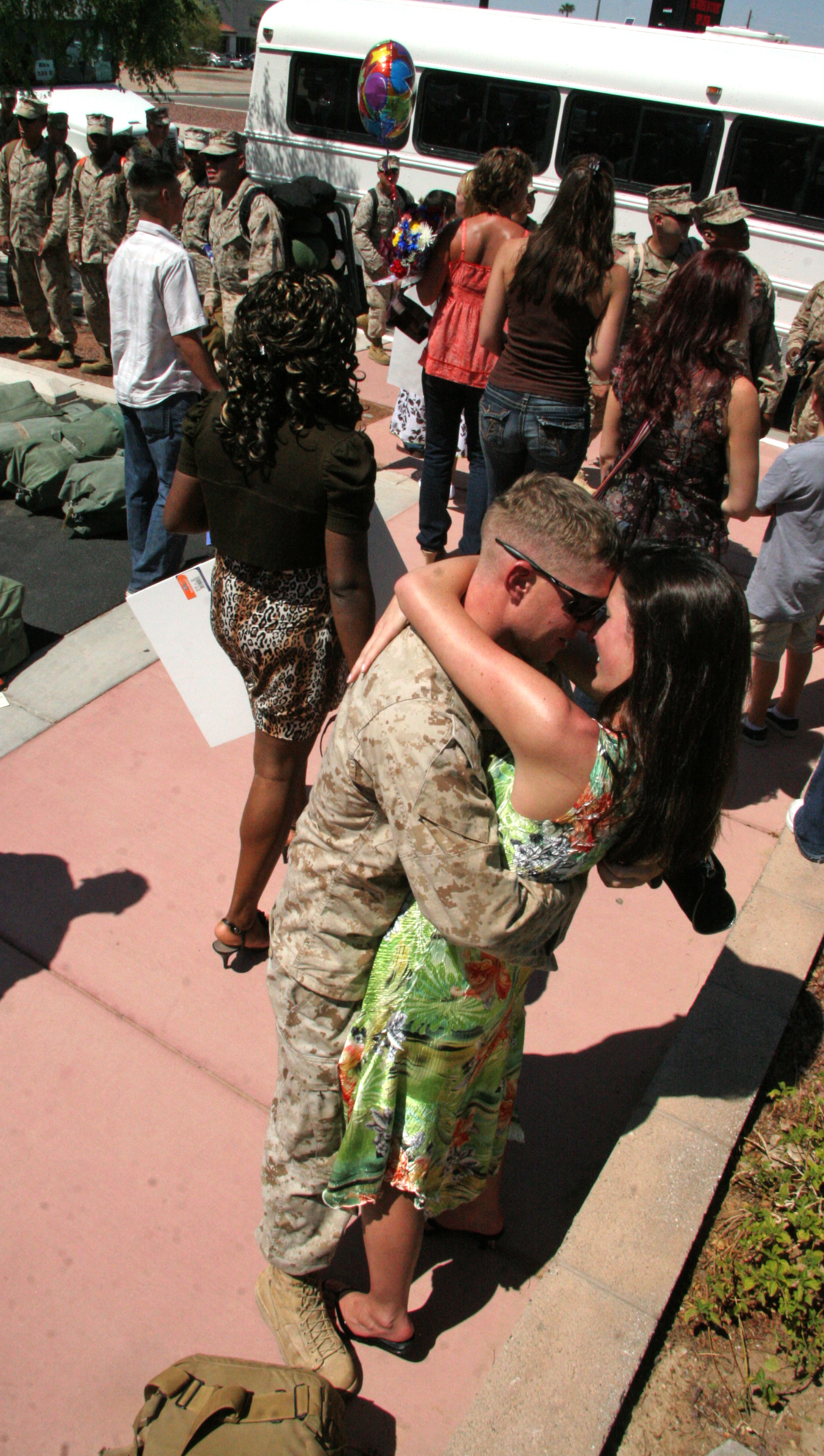 Cpl. Ryan Arnold, Marine Wing Support Squadron 371 heavy equipment operator, meets his girlfriend, Katie Froid, for the first time in person after returning to the Marine Corps Air Station in Yuma, Ariz., from a deployment to Afghanistan, Sept. 7, 2009. The two began corresponding a month into Arnold’s deployment after being introduced by a fellow Marine’s spouse. Approximately 150 Marines from MWSS-371 returned to the air station after the seven-month deployment supporting the 2nd Marine Expeditionary Brigade by constructing and maintaining airfields.