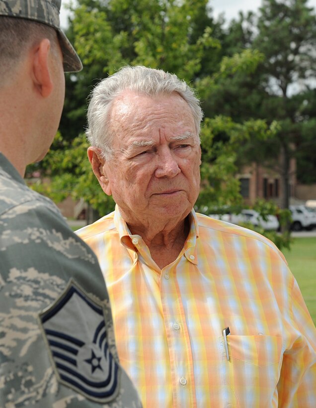LANGLEY AIR FORCE BASE, Va. - Master Sgt. Robert Casagrande, Air Combat Command joint surveillance and target attack radar system manager, talks to retired Col. Frederick Crow, an F-4C pilot and prisoner-of-war during the Vietnam War, at the newly constructed POW/MIA Memorial here Sept. 3. (U.S. Air Force photo/Airman 1st Class Gul Crockett)
