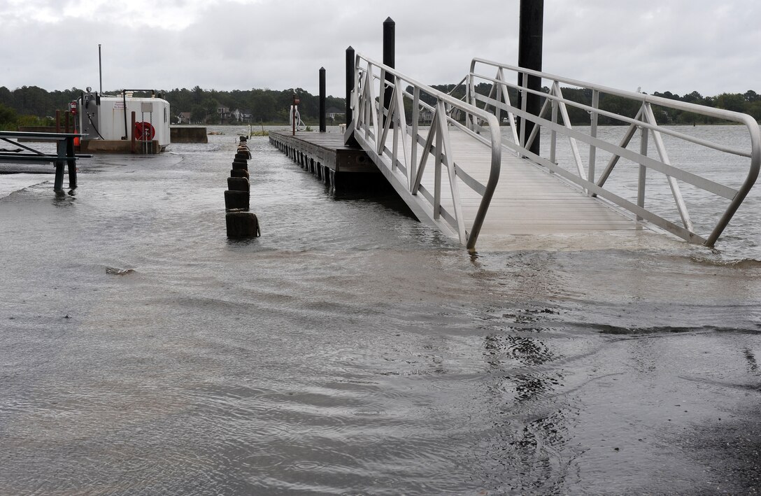 LANGLEY AIR FORCE BASE, Va. --  Beware of flash flooding, standing water.  Although Langley isn't often affected by hurricanes, severe weather is expected throughout the summer months, and flash flooding is a dangerous byproduct of torrential downpours. Lt. Col. Matt Esper, 1st Fighter Wing Safety Office chief of safety, advises drivers to avoid driving through areas of standing water, as it may disable vehicles. Drivers cannot gauge how deep the water is and may be deeper than it appears. Also, drivers are advised to avoid driving through moving water. If you notice any areas of standing water on base, call the 1st Civil Engineer Squadron at 764-5342.  (U.S. Air Force photo/Senior Airman Zachary Wolf)