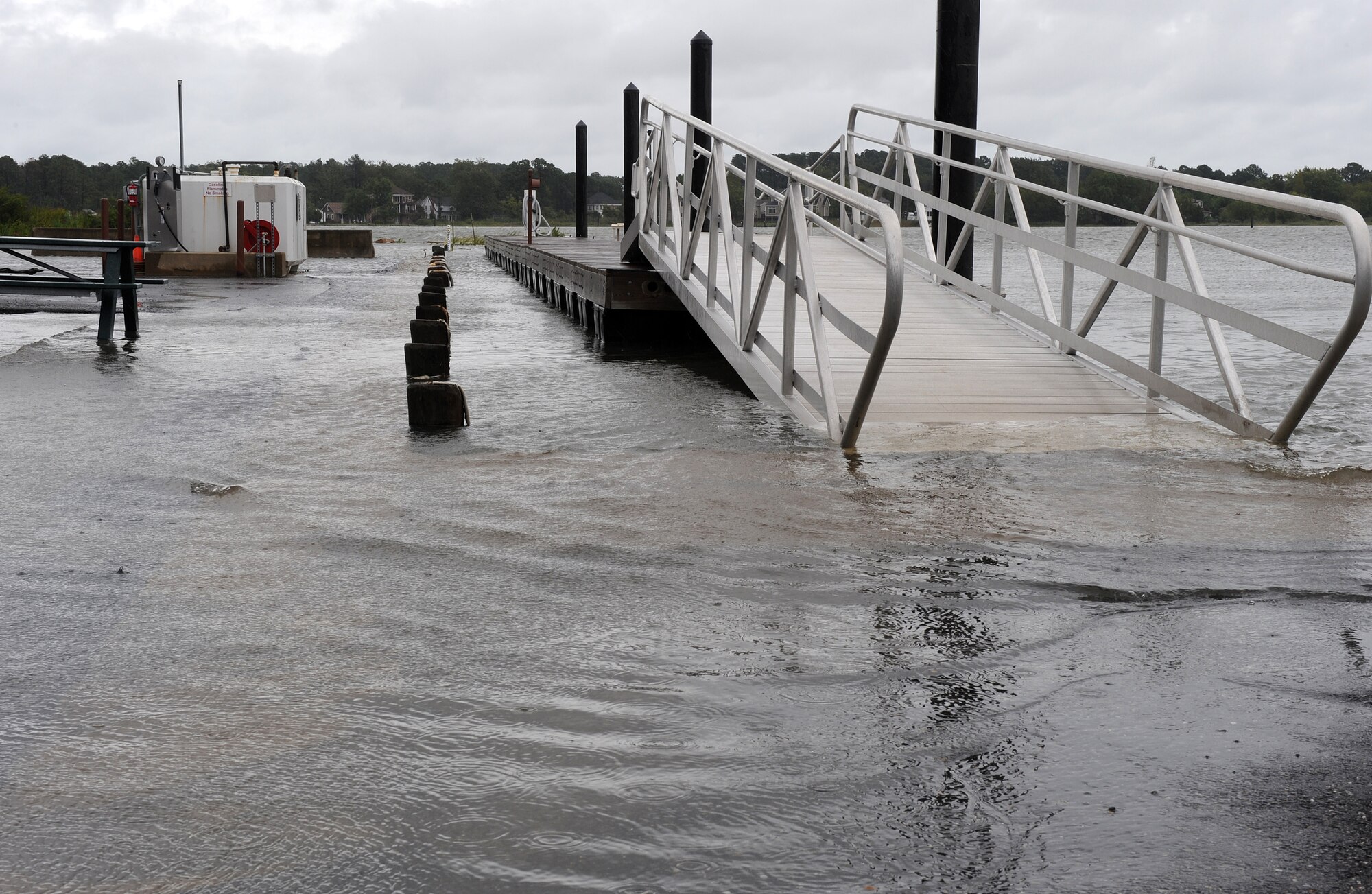 LANGLEY AIR FORCE BASE, Va. --  Beware of flash flooding, standing water.  Although Langley isn't often affected by hurricanes, severe weather is expected throughout the summer months, and flash flooding is a dangerous byproduct of torrential downpours. Lt. Col. Matt Esper, 1st Fighter Wing Safety Office chief of safety, advises drivers to avoid driving through areas of standing water, as it may disable vehicles. Drivers cannot gauge how deep the water is and may be deeper than it appears. Also, drivers are advised to avoid driving through moving water. If you notice any areas of standing water on base, call the 1st Civil Engineer Squadron at 764-5342.  (U.S. Air Force photo/Senior Airman Zachary Wolf)