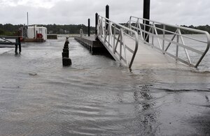 LANGLEY AIR FORCE BASE, Va. --  Beware of flash flooding, standing water.  Although Langley isn't often affected by hurricanes, severe weather is expected throughout the summer months, and flash flooding is a dangerous byproduct of torrential downpours. Lt. Col. Matt Esper, 1st Fighter Wing Safety Office chief of safety, advises drivers to avoid driving through areas of standing water, as it may disable vehicles. Drivers cannot gauge how deep the water is and may be deeper than it appears. Also, drivers are advised to avoid driving through moving water. If you notice any areas of standing water on base, call the 1st Civil Engineer Squadron at 764-5342.  (U.S. Air Force photo/Senior Airman Zachary Wolf)