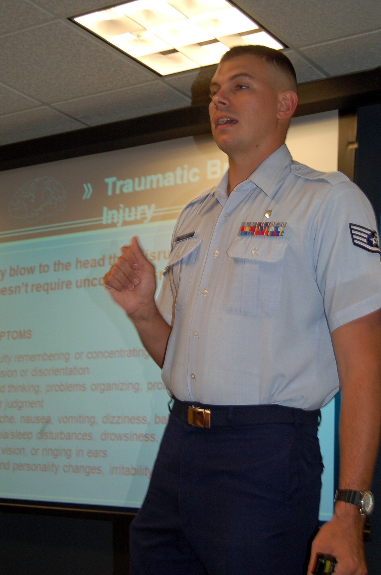 Staff Sgt. Seth Russell, 21st Medical Operations Squadron, briefs servicemembers during the Deployment Readiness Briefing at the Airmen and Family Readiness Center Aug. 31. Sergeant Russell oversees wing Post Traumatic Stress Disorder-related issues. (Air Force photo by Thea Skinner)