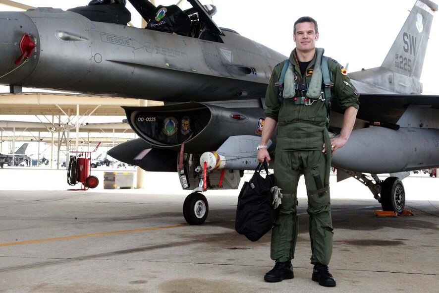 SHAW AIR FORCE BASE, S.C. -- Flight Lt. Andrew Mallery-Blythe, a Royal Air Force (United Kingdom) exchange pilot, stands in front a 79th Fighter Squadron F-16 here Aug. 21. The pilot exchange program trades fliers from different countries to learn how allies fly, train and fight. The purpose of the program is to improve international relations and pilot adaptability. (U.S. Air Force photo/Staff Sgt. John Gordinier)