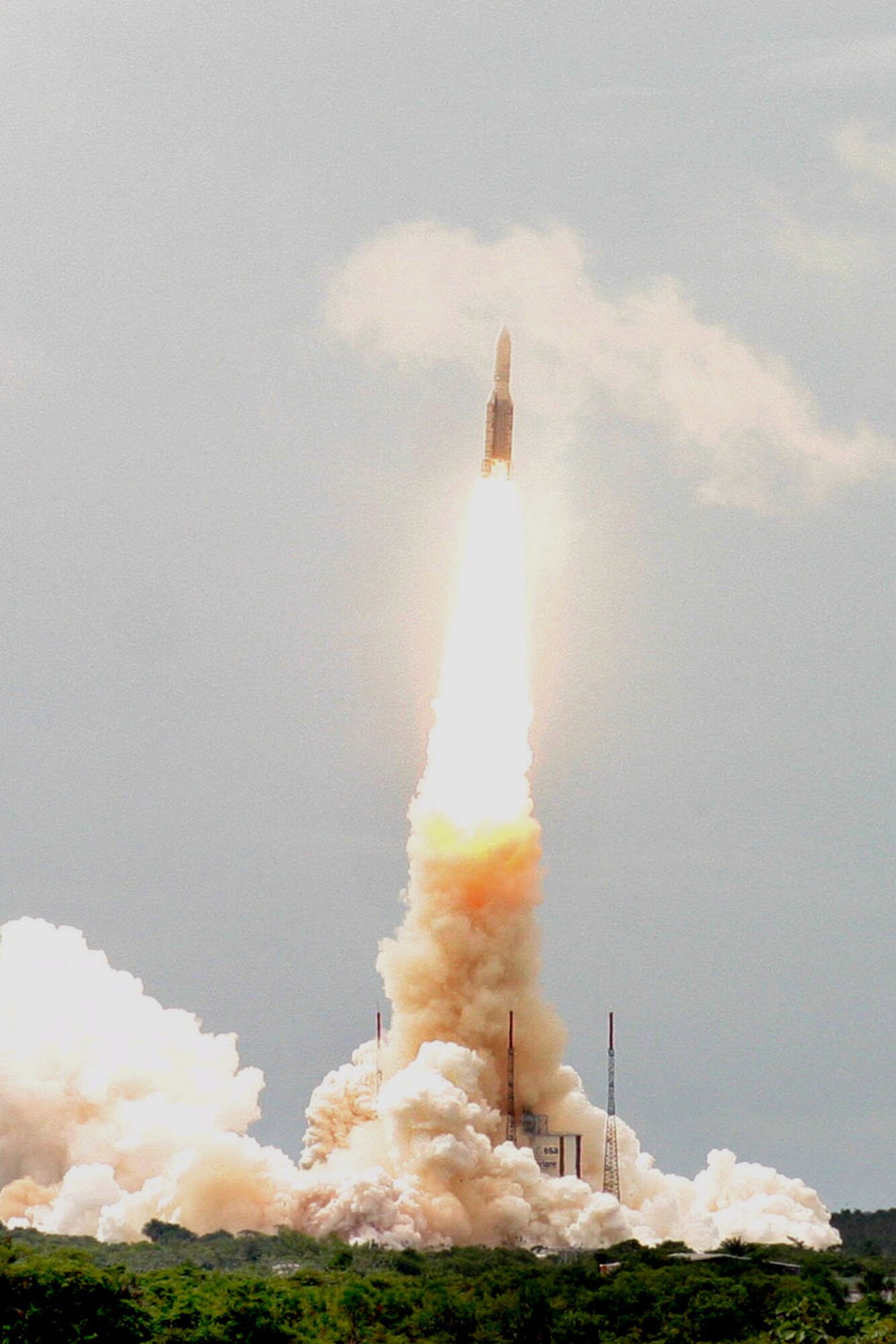 As a part of the trip to French Guiana, the group had the opportunity to watch the launch of an Ariane 5 rocket July 1.  This launch used the ECA version of the rocket designed specifically for carrying the largest payloads to Earth orbit. The payload for this flight was the TerreStar-1 satellite built by Space Systems Loral.  It is the world’s largest and most powerful commercial satellite, and it will be a part of the nation’s first all IP mobile communications network. TerreStar announced the successful completion of the first end-to-end call using the satellite July 22. (Photo by Peter Montgomery)
