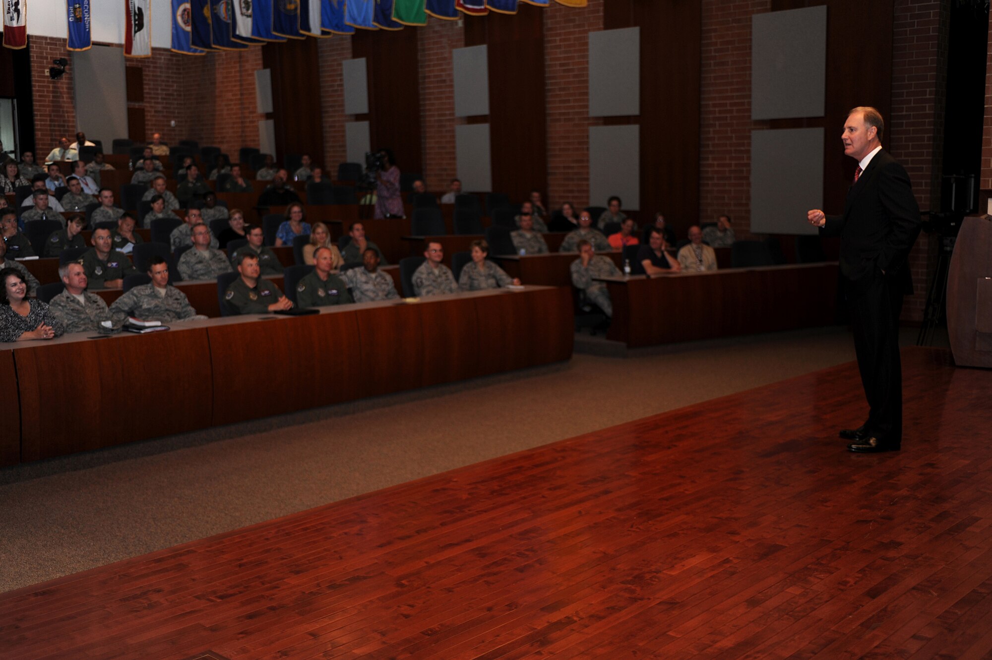 Mr. Gary Kelly provides motivational remarks to the crowd assembled in Grace Peterson Hall Aug. 12 at the U.S. Air Force Expeditionary Center on the Fort Dix section of Joint Base McGuire-Dix-Lakehurst, N.J.  Mr. Kelly, chief executive officer of SouthWest Airlines, was the fourth speaker in a series of professional development events helping the Center celebrate its 15th Anniversary. Mr. Kelly spoke about the Airmen and Soldiers returning from Iraq who talked about traits they admired in their leaders.  “They said the leaders they respected the most were the one’s that they knew cared for them.  It wasn’t how smart they were or how accomplished they were, it was whether they could convince them that they cared for them.”  (U.S. Air Force Photo/Staff Sgt. Nathan G. Bevier) 