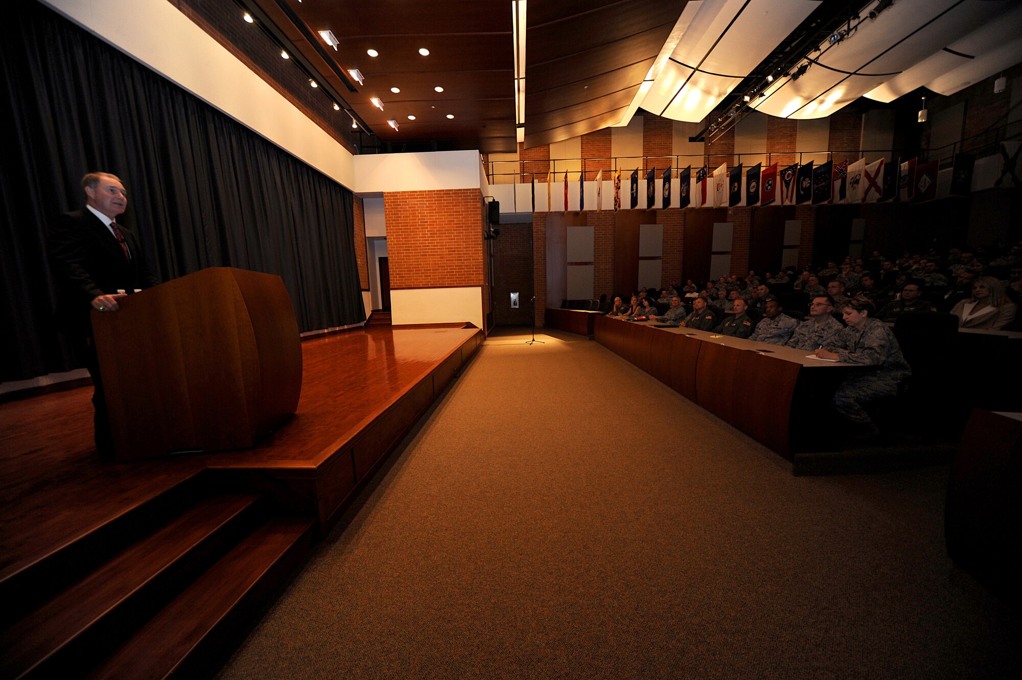 Mr. Gary Kelly provides motivational remarks to the crowd assembled in Grace Peterson Hall Aug. 12 at the U.S. Air Force Expeditionary Center on the Fort Dix section of Joint Base McGuire-Dix-Lakehurst, N.J.  Mr. Kelly, chief executive officer of SouthWest Airlines, was the fourth speaker in a series of professional development events helping the Center celebrate its 15th Anniversary. In speaking on the growth of SouthWest Airlines, which carried more U.S. passengers than any other airline in 2008, Mr. Kelly said, “It was never our objective to be the biggest - I think that’s kind of a foolish objective - actually, something that you take pride in, the objective was to be excellent in everything that we do.” (U.S. Air Force Photo/Staff Sgt. Nathan G. Bevier) 