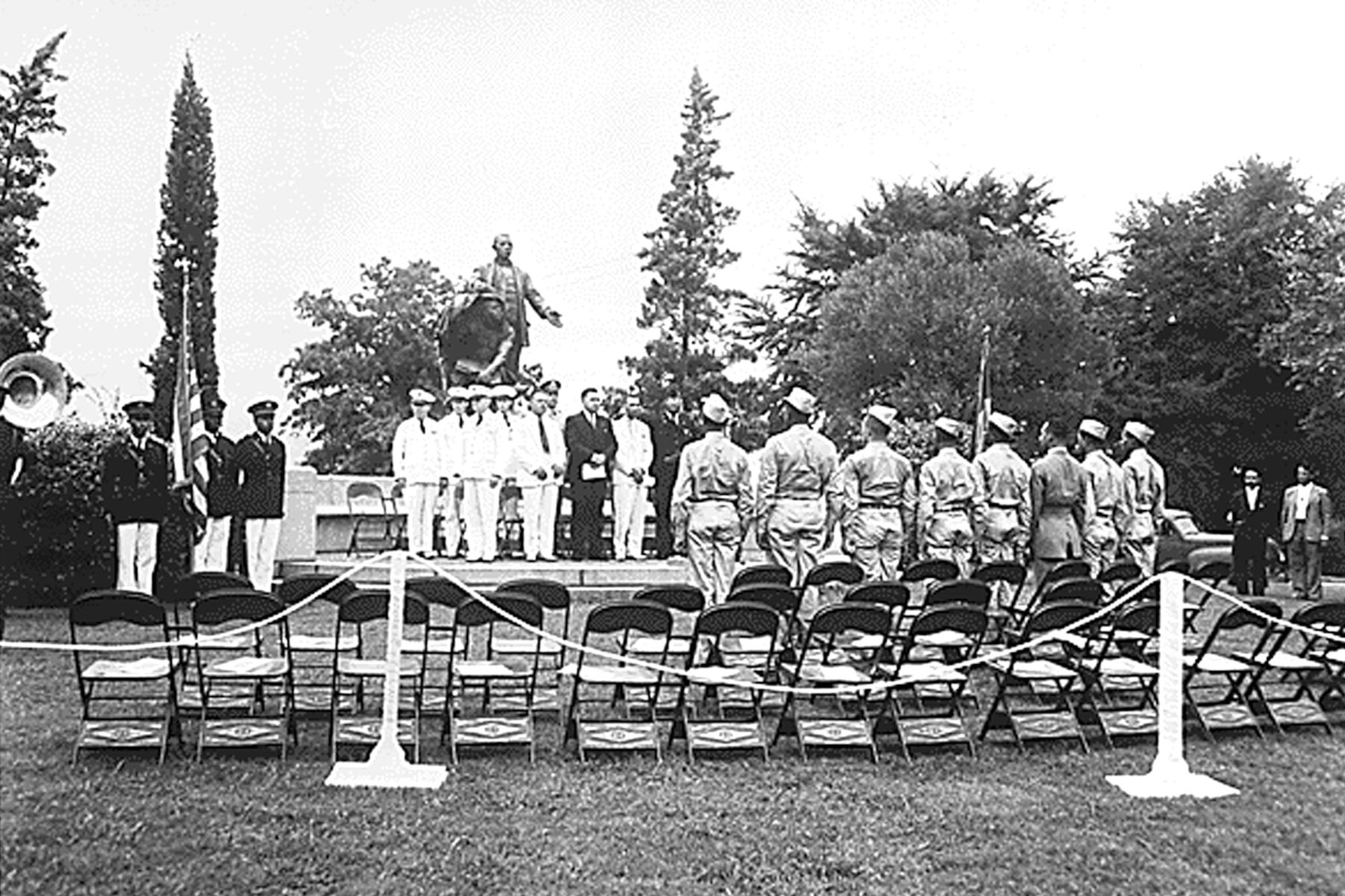 Cadets are welcomed to Army Air Corps training in front of the Booker T. Washington monument at Tuskegee Institute, August 1941. (U.S. Air Force photo)