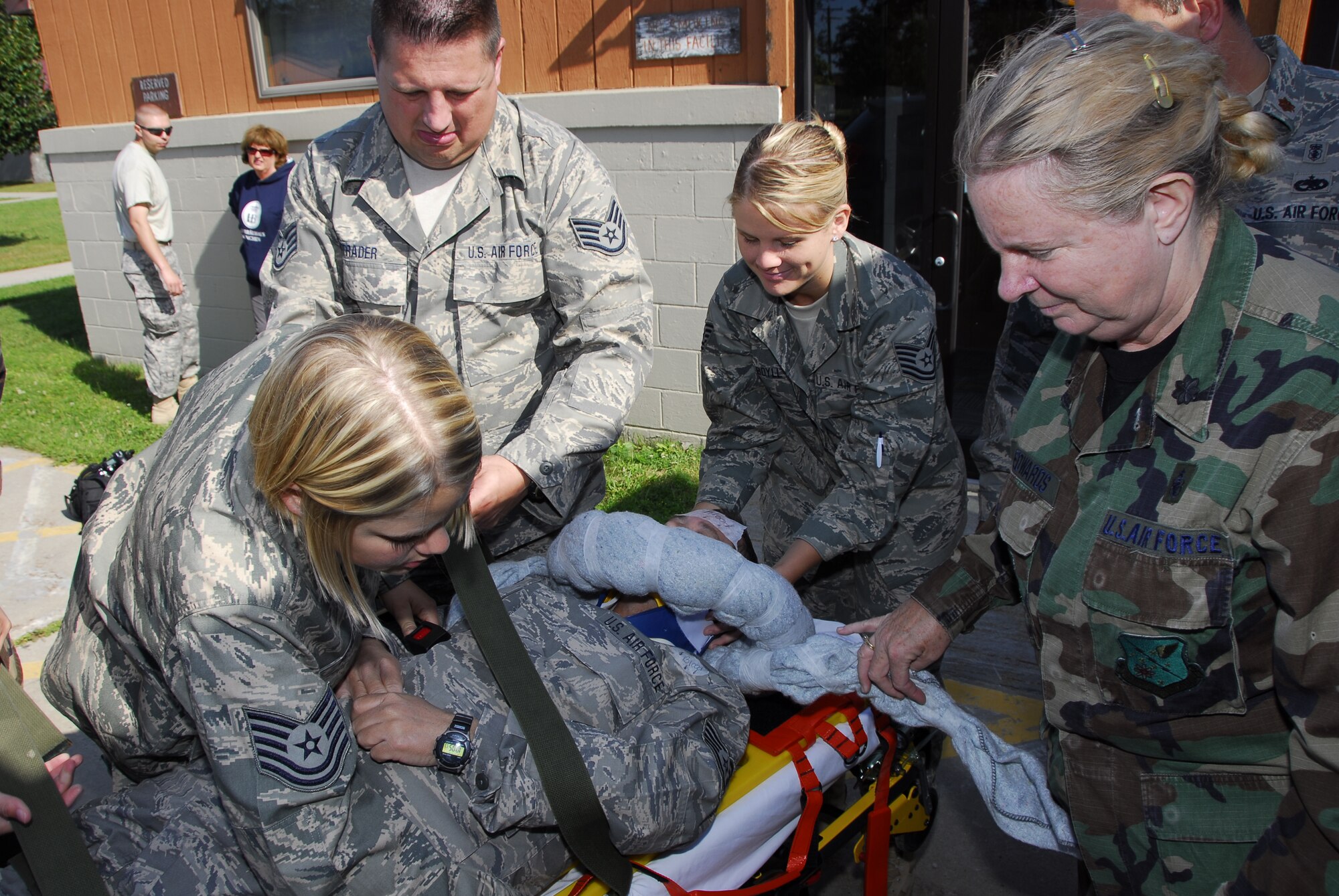 Medical staff exercise their response skills to a wounded Airman. Photo by MSgt John Day