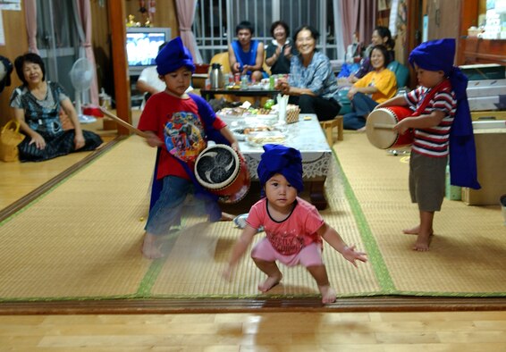 Young Okinawan children give an opening performance of Eisa dancing on the third evening of Obon for the ancestors to watch. Throughout Obon, there will be Eisa dancers and celebrating here on Okinawa. People will be having a good time with their families, and dancing may last late into the evening.
(U.S. Air Force photo/Tech. Sgt. Rey Ramon) 